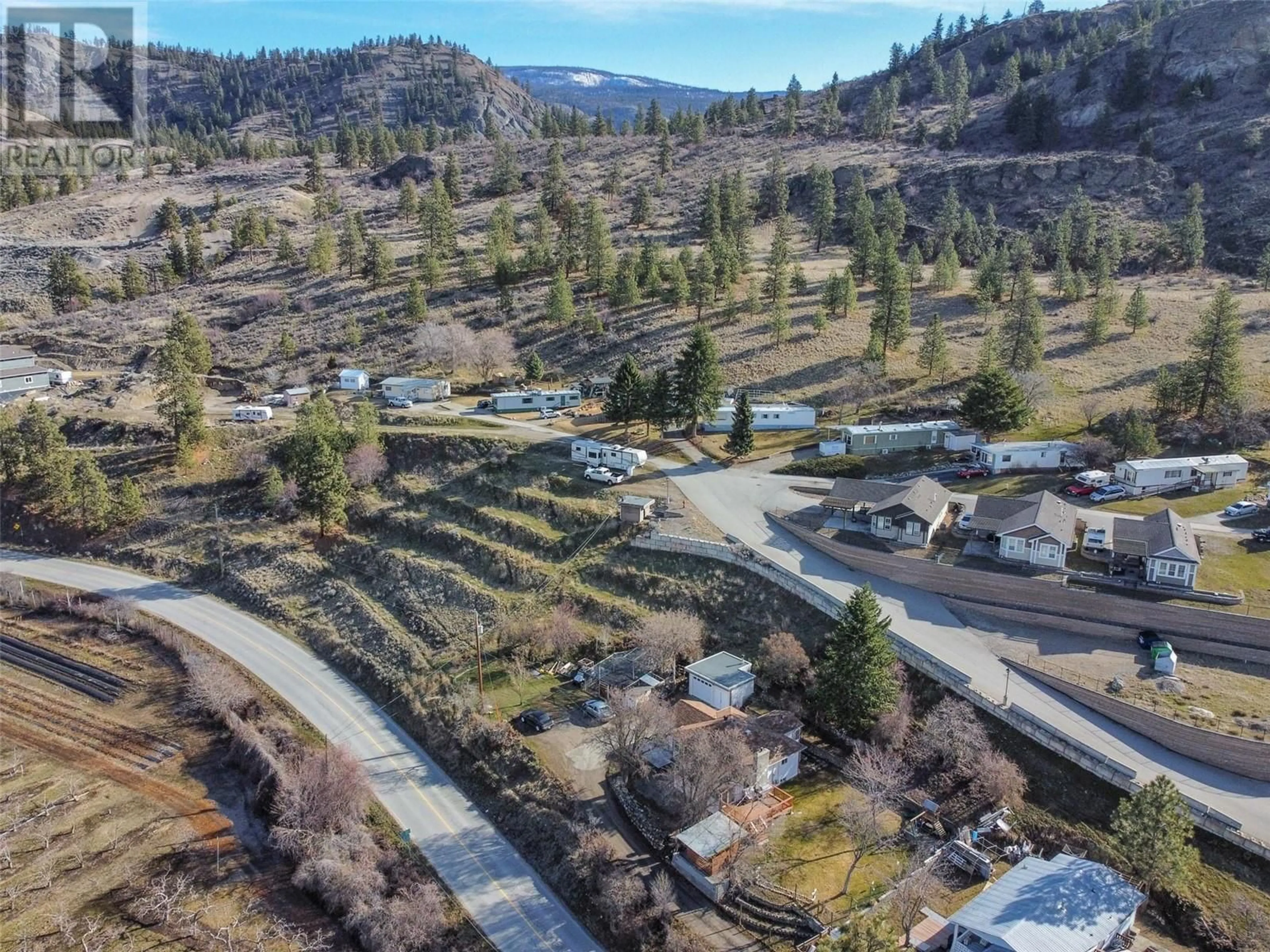 A pic from outside/outdoor area/front of a property/back of a property/a pic from drone, mountain view for 541 Eastside Road, Okanagan Falls British Columbia V0H1R5