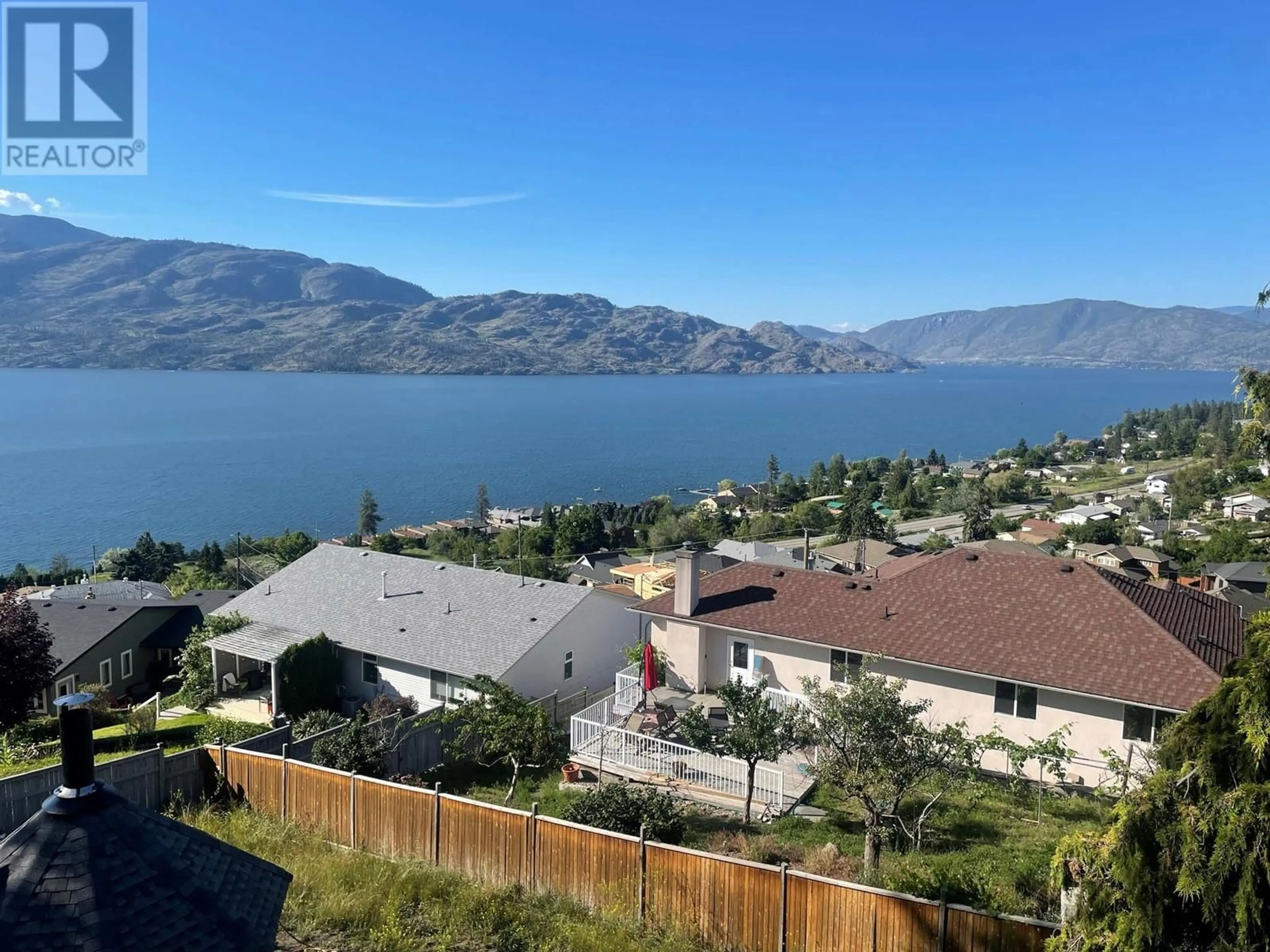 A pic from outside/outdoor area/front of a property/back of a property/a pic from drone, water/lake/river/ocean view for 5175 Clarence Road, Peachland British Columbia V0H1X2