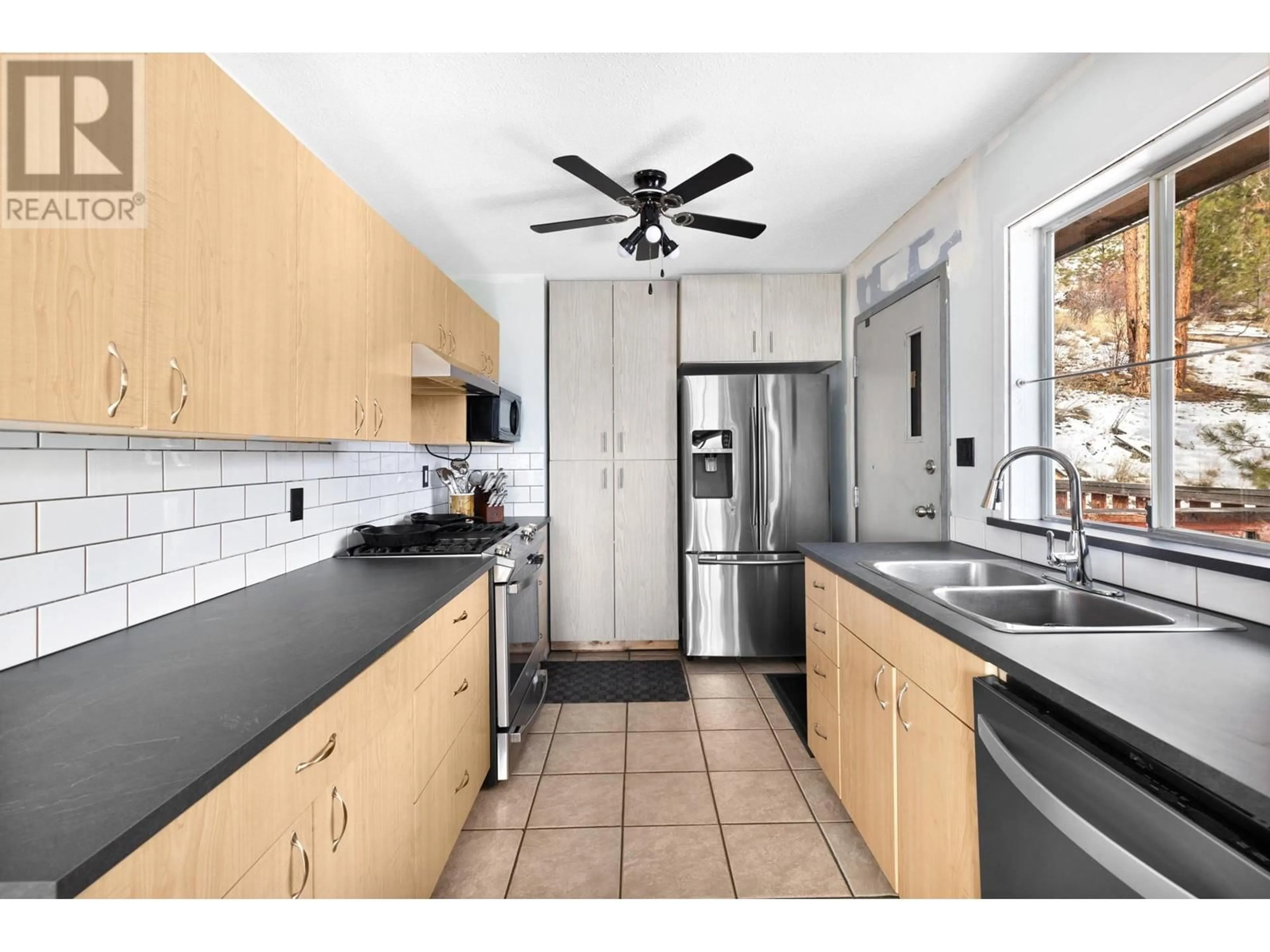 Standard kitchen, ceramic/tile floor for 5175 Clarence Road, Peachland British Columbia V0H1X2