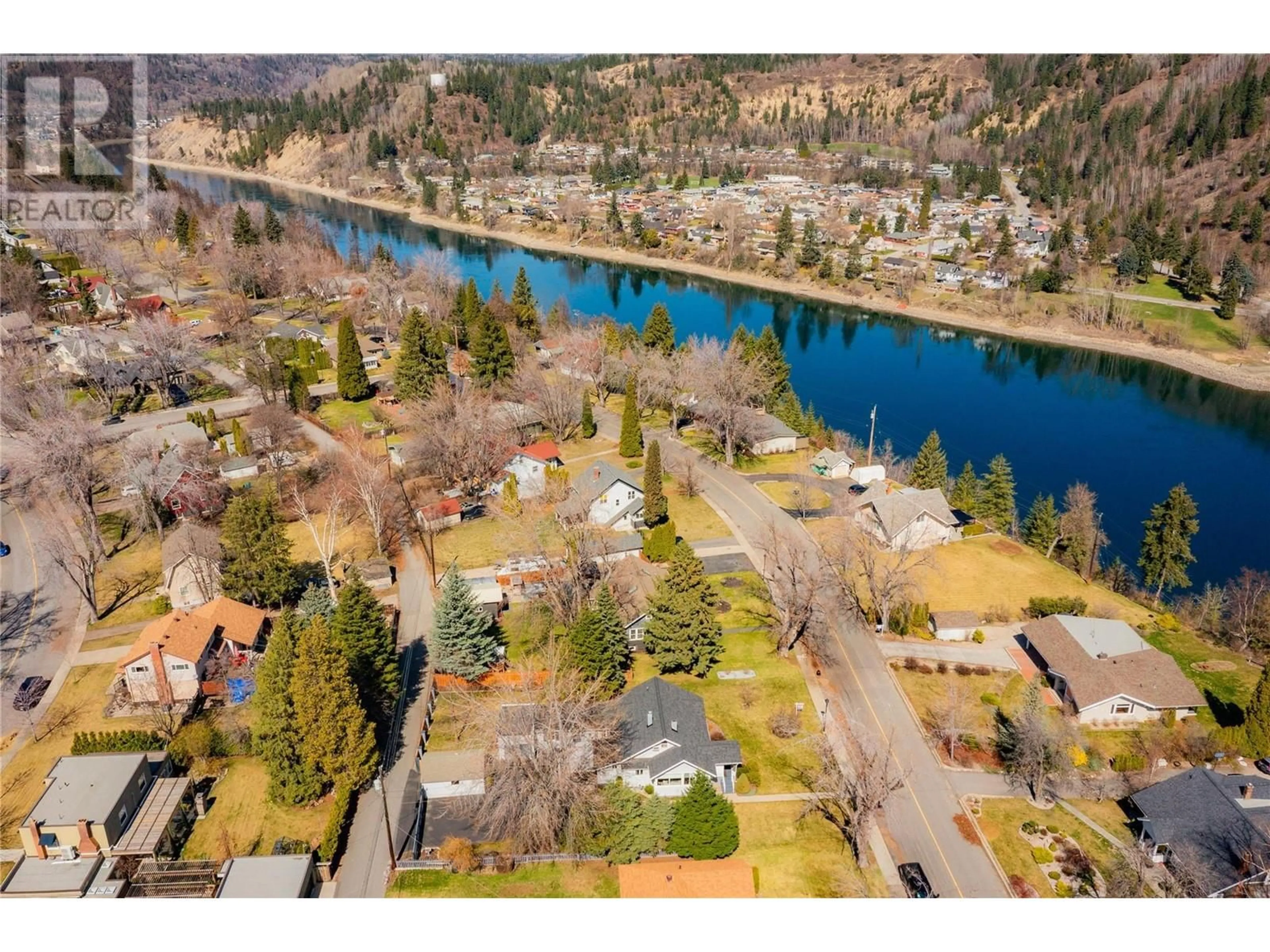 A pic from outside/outdoor area/front of a property/back of a property/a pic from drone, water/lake/river/ocean view for 107 RITCHIE AVENUE, Trail British Columbia V1R1G8