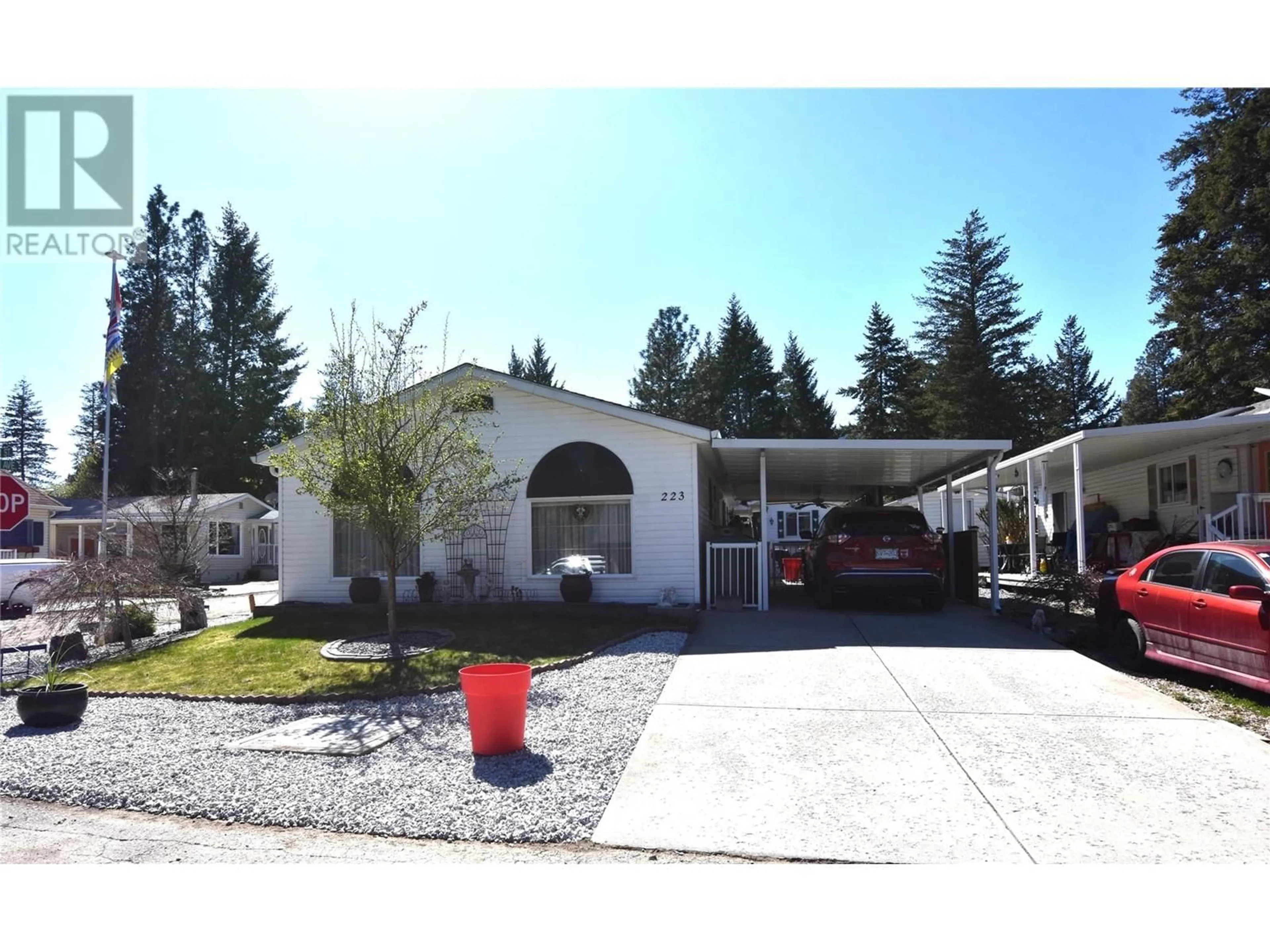 Home with vinyl exterior material, street for 223 COUGAR STREET, Vernon British Columbia V1H2A1