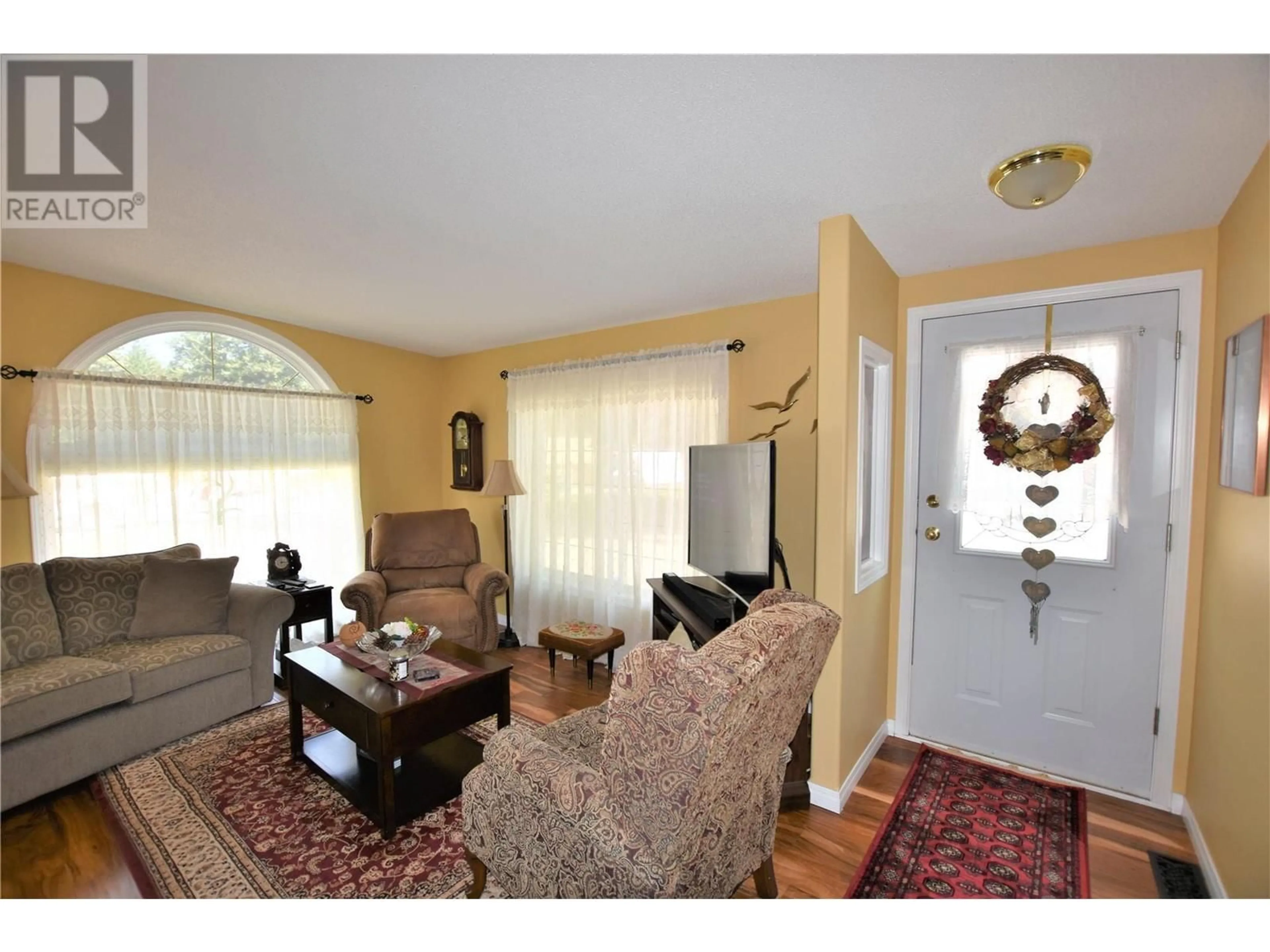 Living room with furniture, unknown for 223 COUGAR STREET, Vernon British Columbia V1H2A1