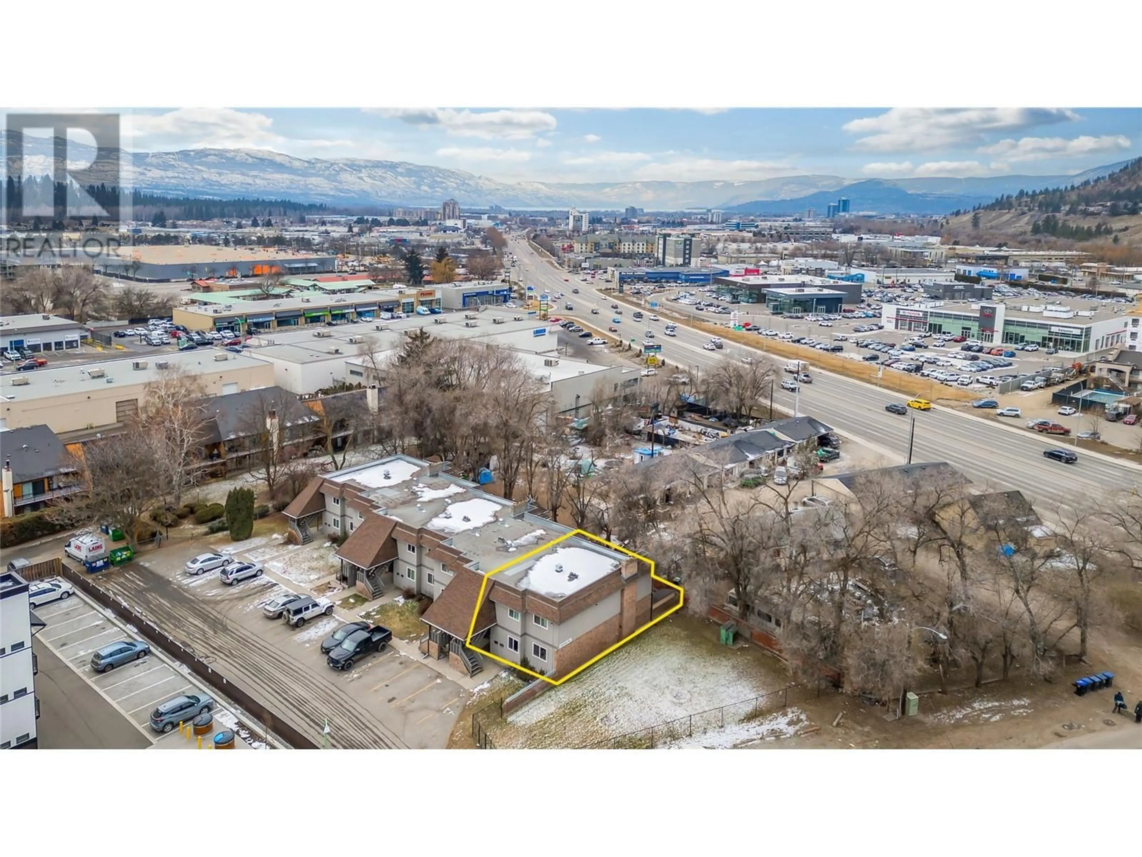 A pic from outside/outdoor area/front of a property/back of a property/a pic from drone, mountain view for 340 Mills Road Unit# 1, Kelowna British Columbia V1X4G8