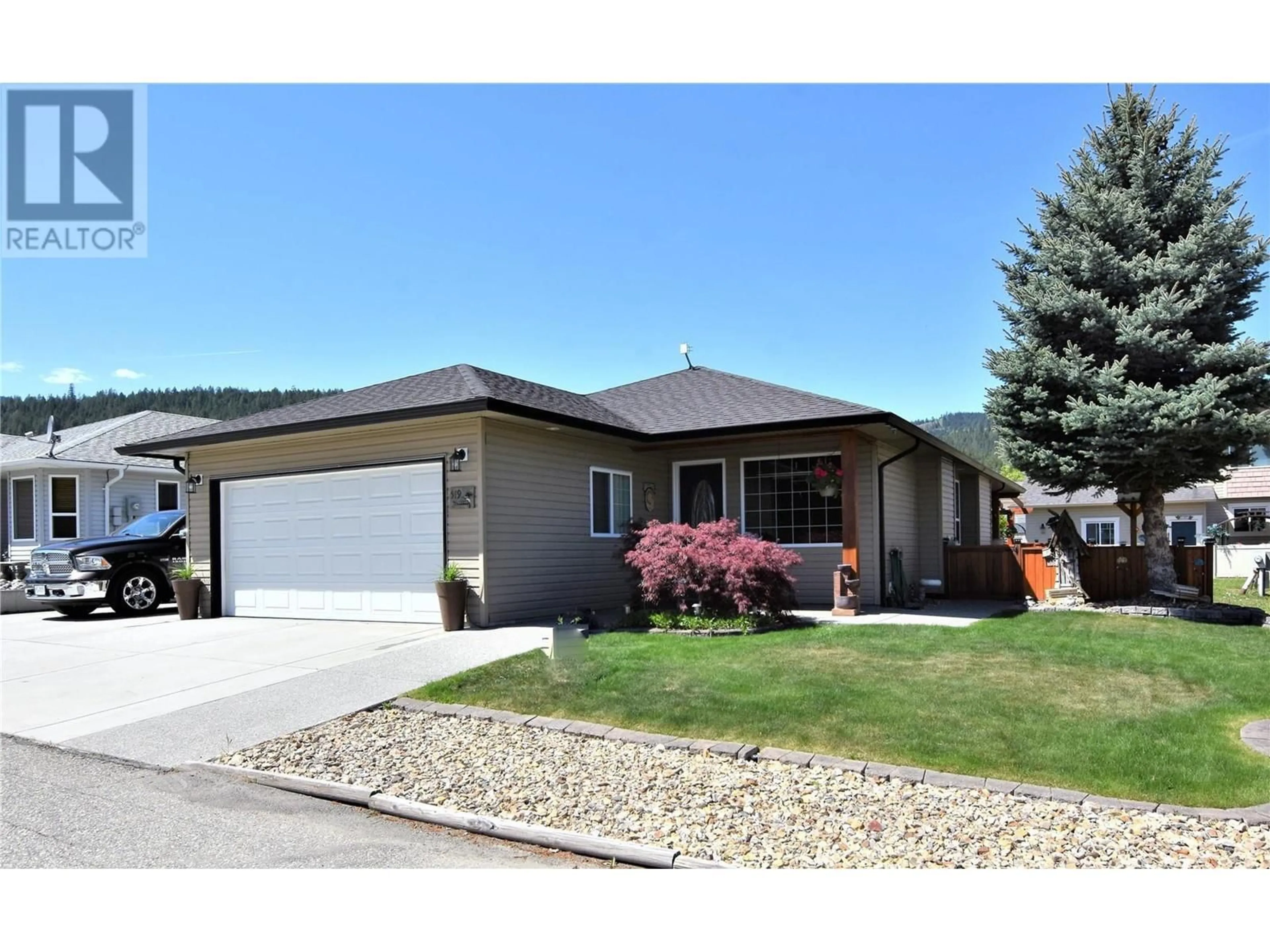 Home with vinyl exterior material, street for 519 LOON AVENUE, Vernon British Columbia V1H2A1