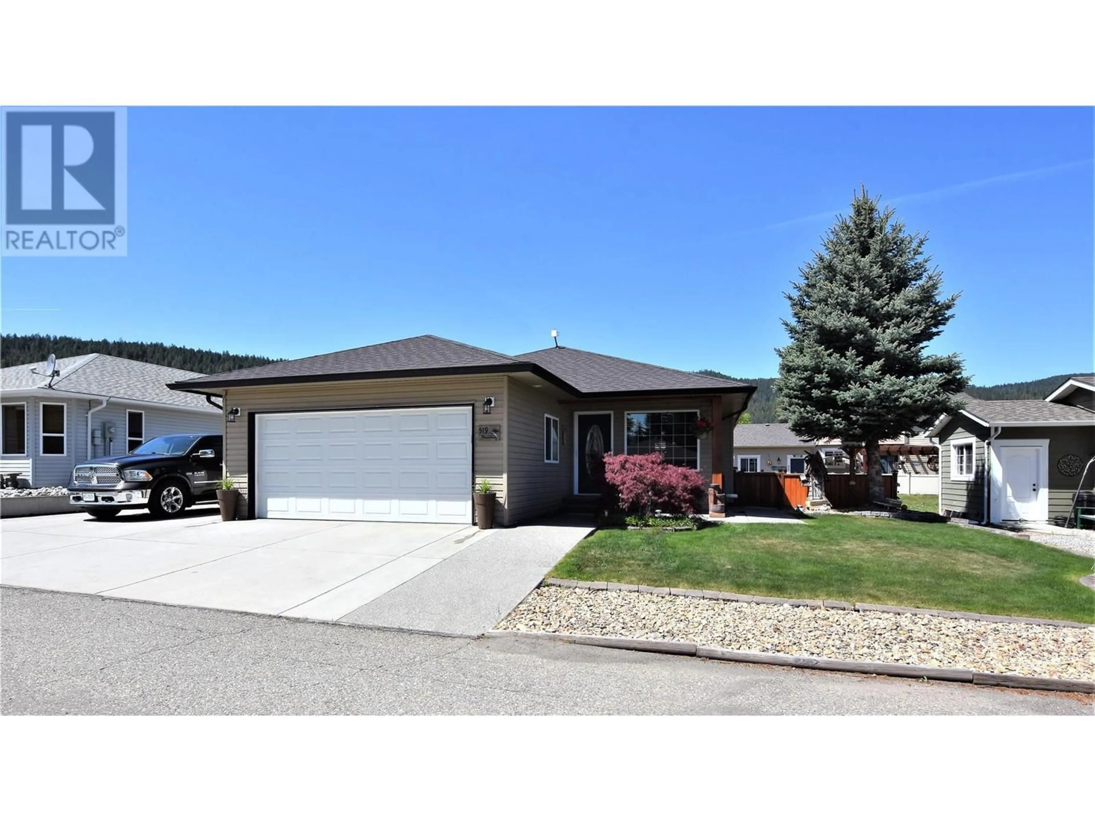 Home with vinyl exterior material, street for 519 LOON AVENUE, Vernon British Columbia V1H2A1