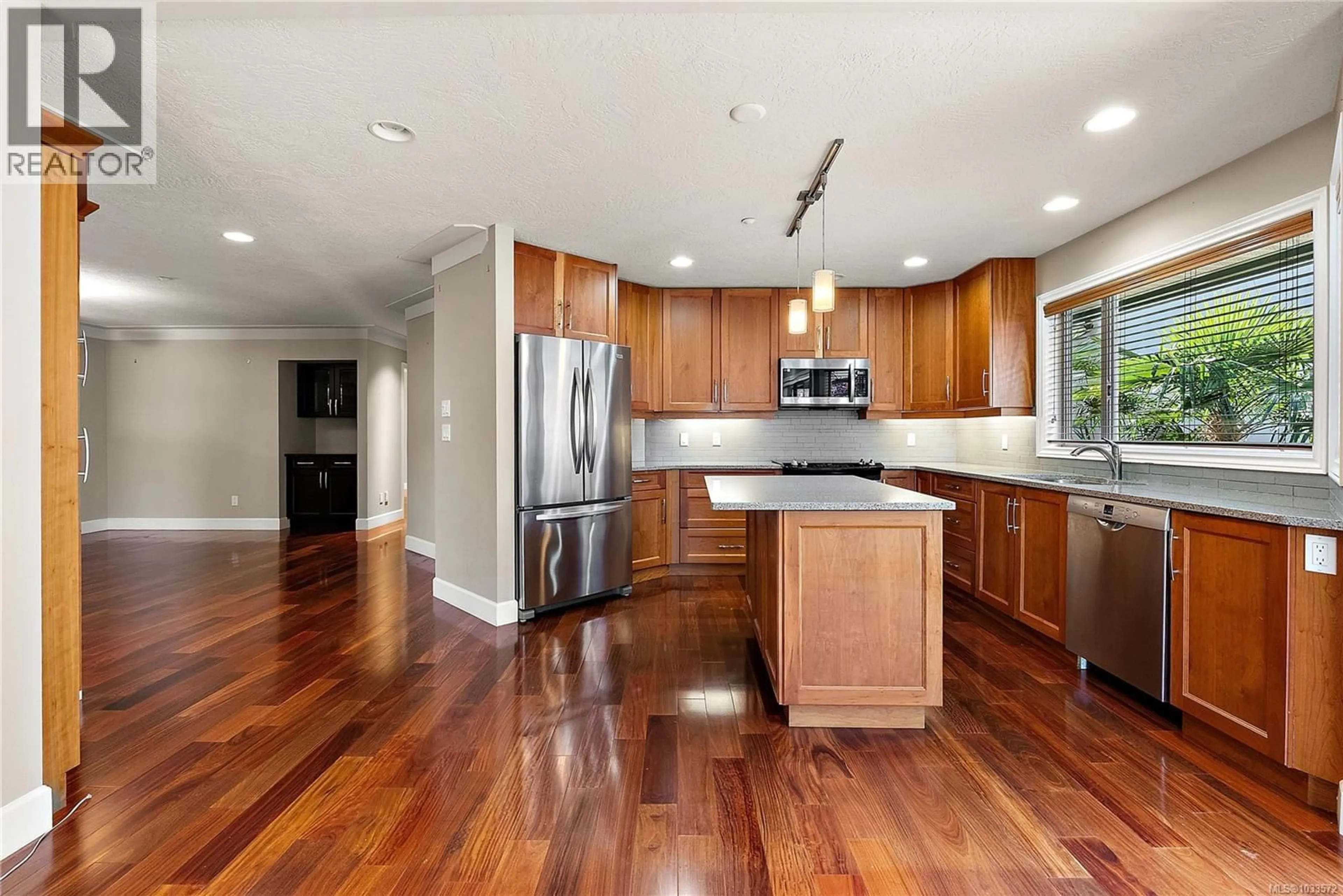 Open concept kitchen, wood/laminate floor for 1 - 9675 FIRST STREET, Sidney British Columbia V8L3C8