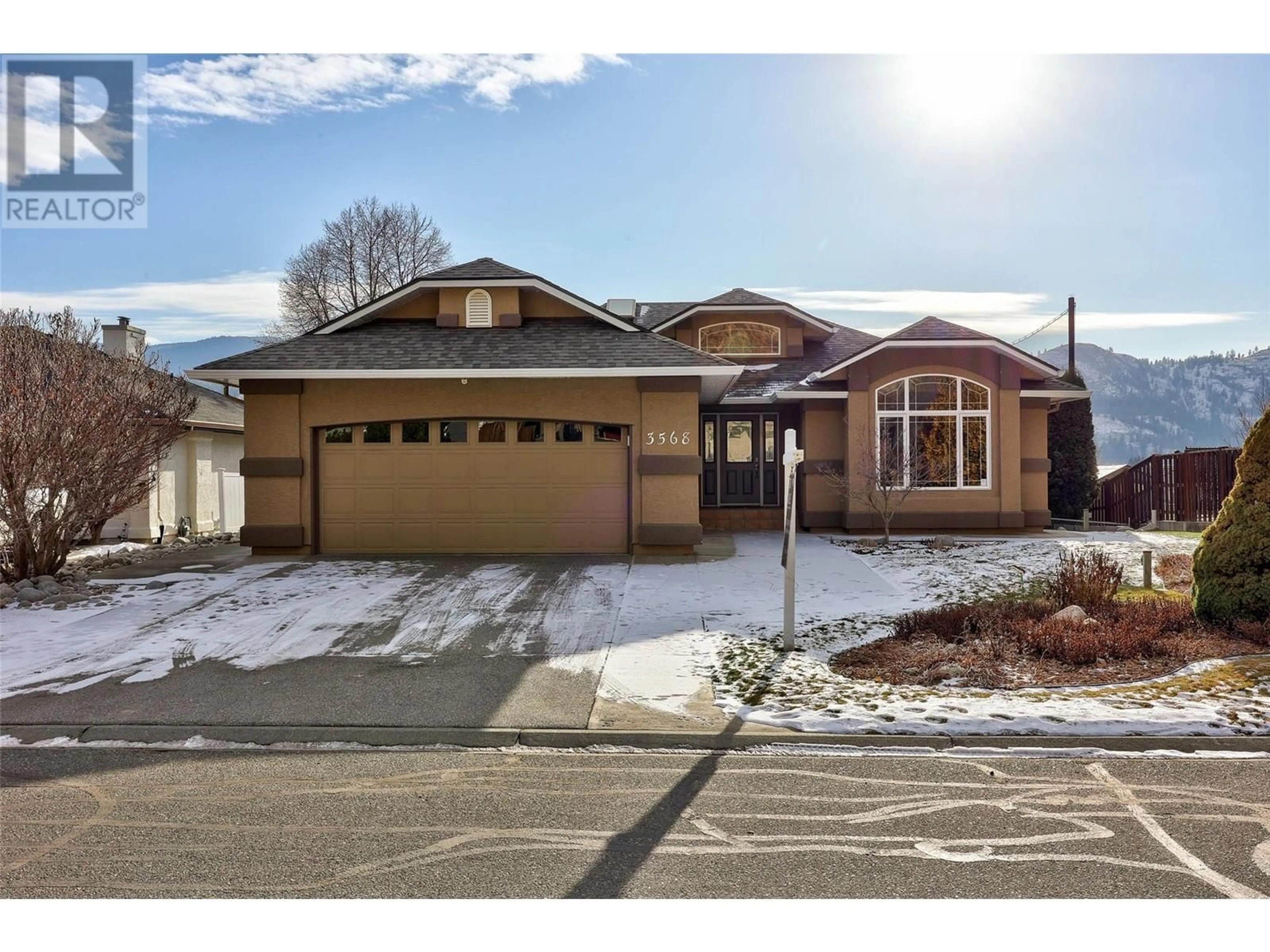 Home with brick exterior material, street for 3568 Navatanee Drive, Kamloops British Columbia V2H1T7