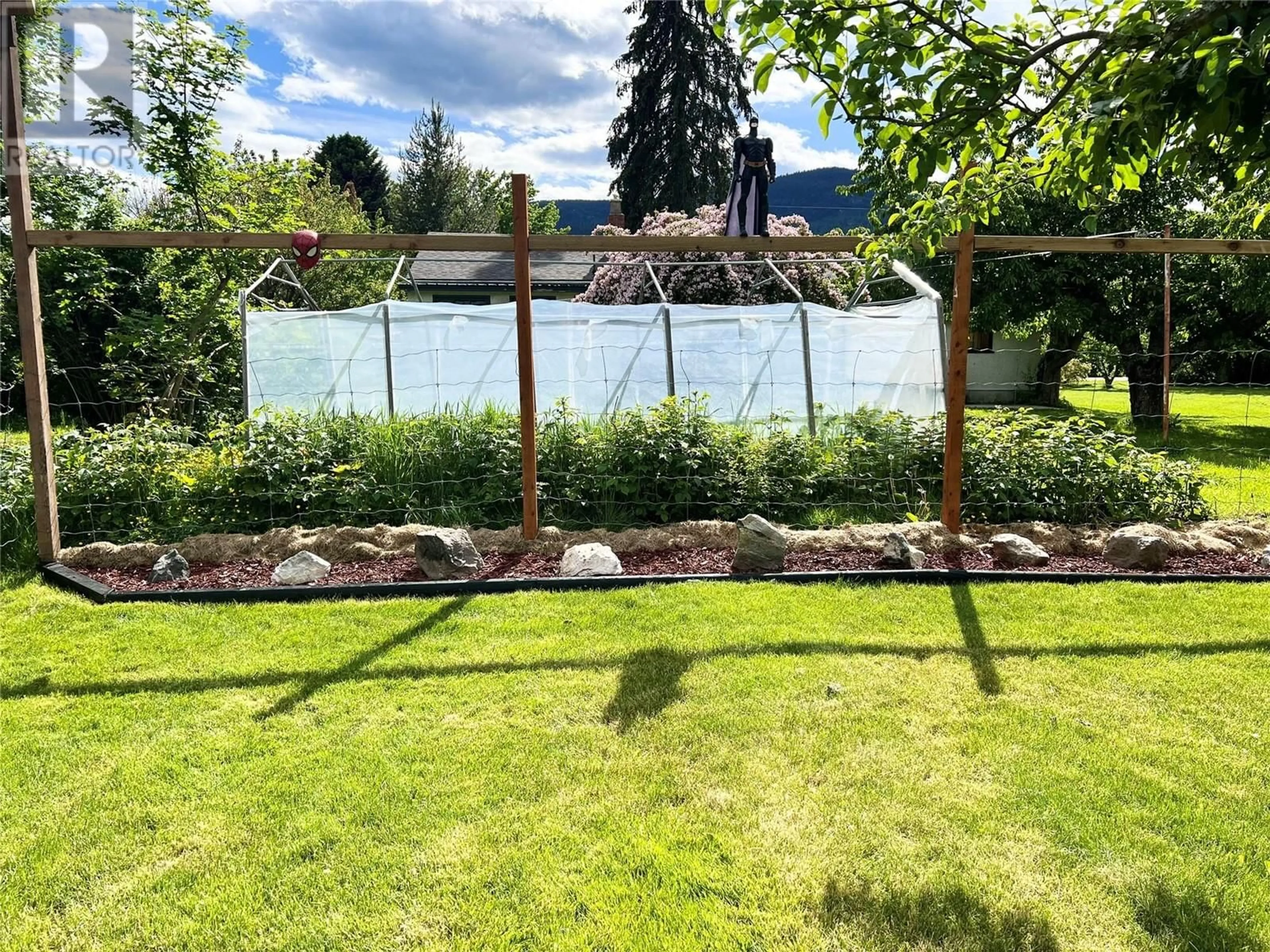 A pic from outside/outdoor area/front of a property/back of a property/a pic from drone, water/lake/river/ocean view for 1916 BRILLIANT ROAD, Castlegar British Columbia V1N4K2