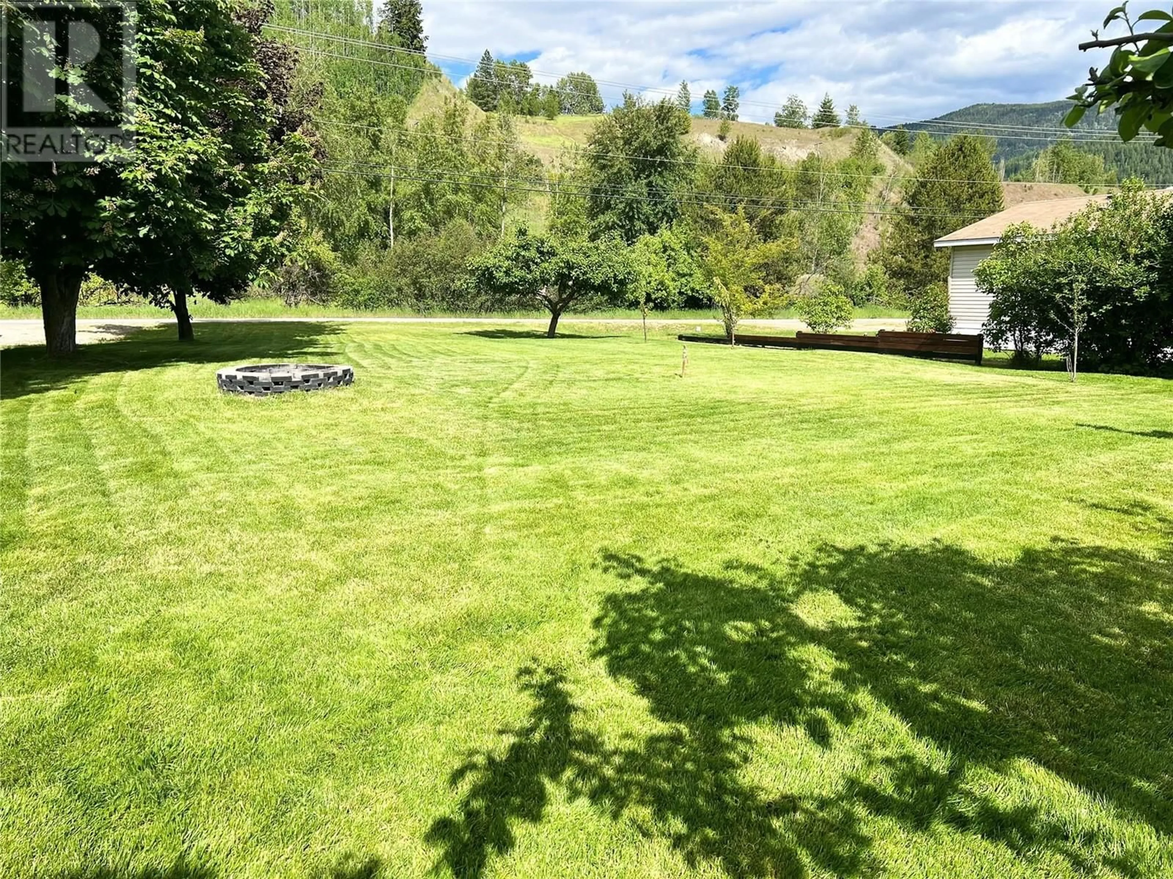 A pic from outside/outdoor area/front of a property/back of a property/a pic from drone, mountain view for 1916 Brilliant Road, Castlegar British Columbia V1N4K2