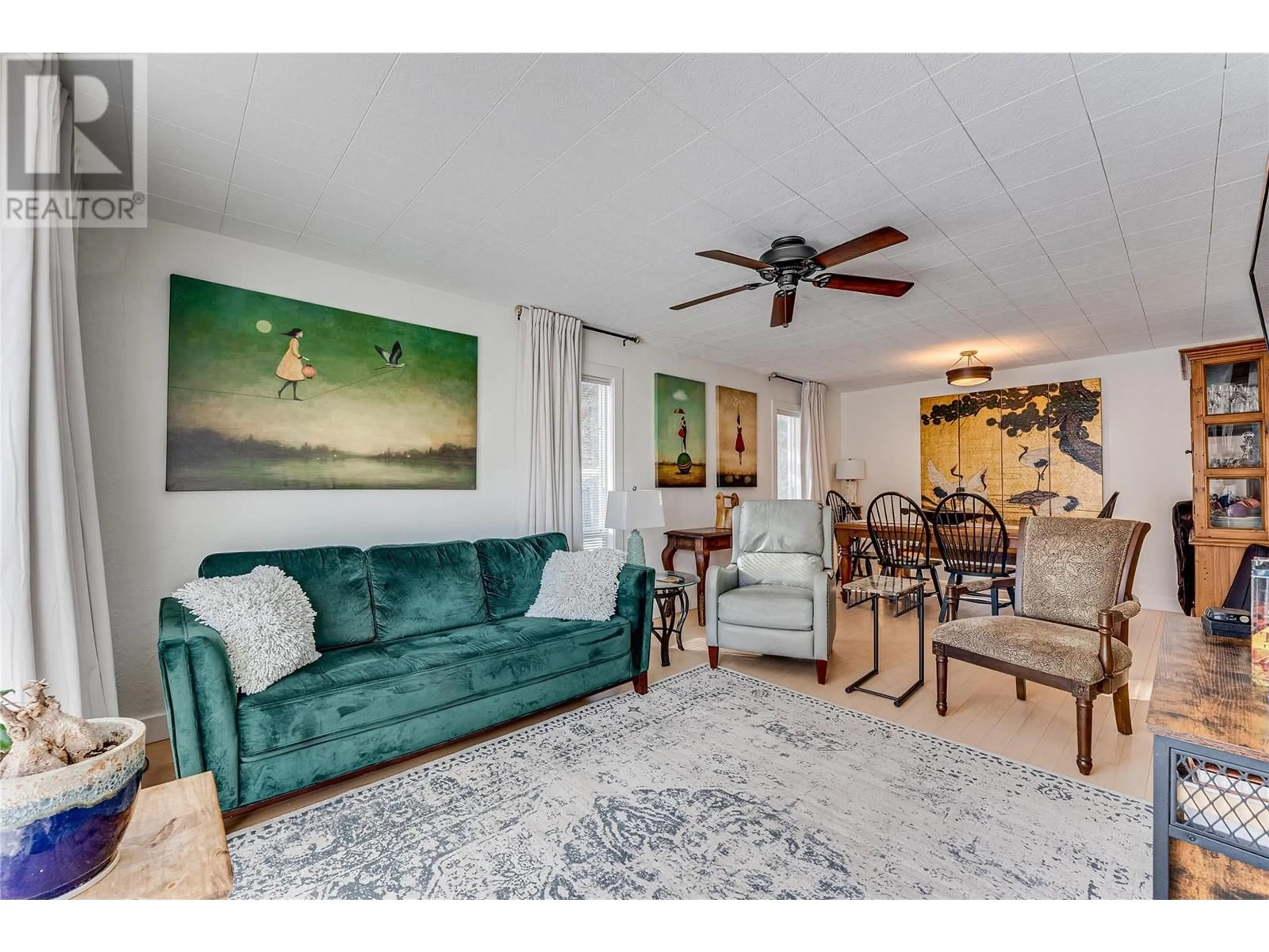 Living room with furniture, unknown for 409 HUMMINGBIRD AVENUE, Vernon British Columbia V1H2A1