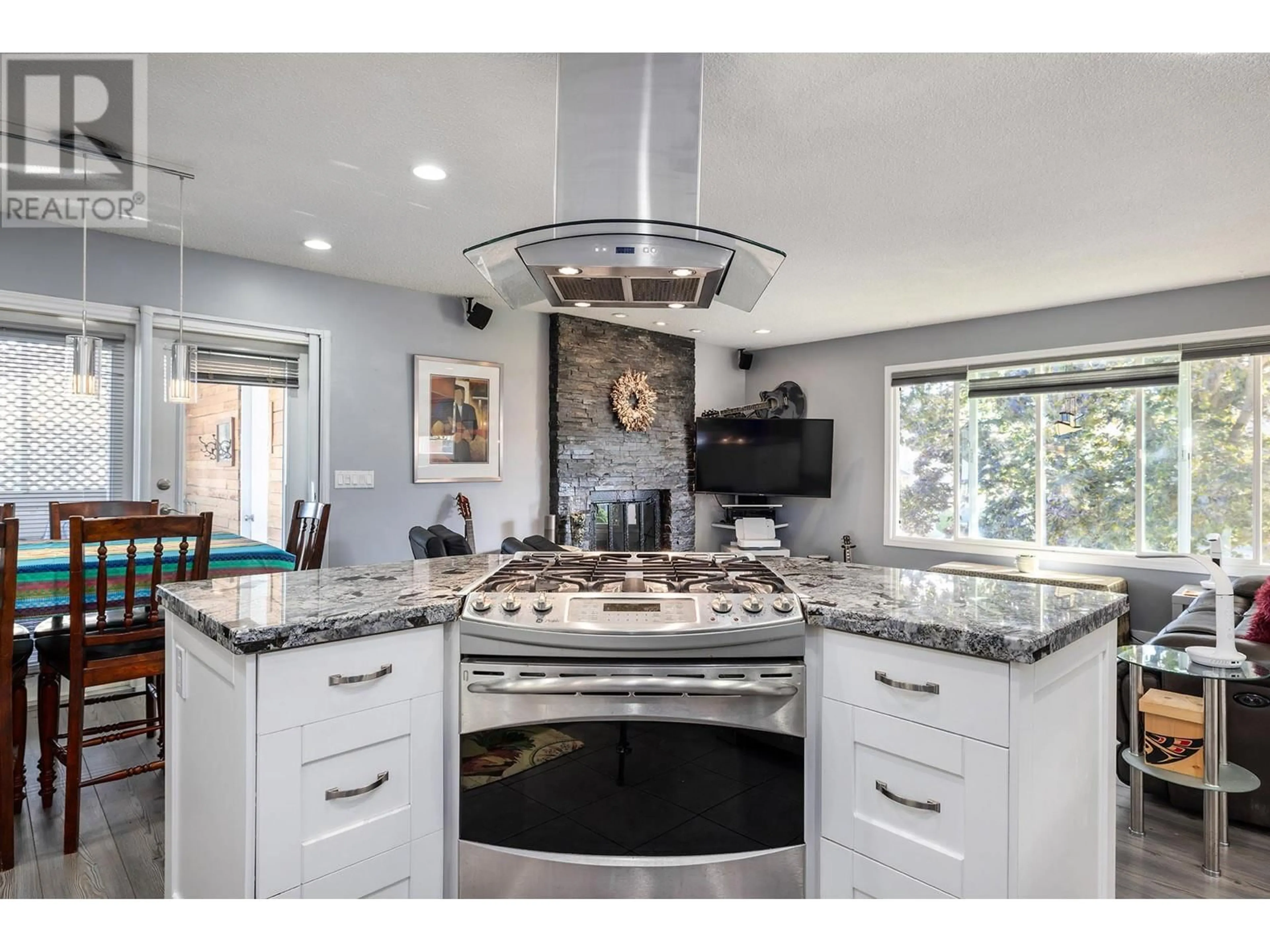 Contemporary kitchen, ceramic/tile floor for 706 Renshaw Road, Kelowna British Columbia V1X6C8