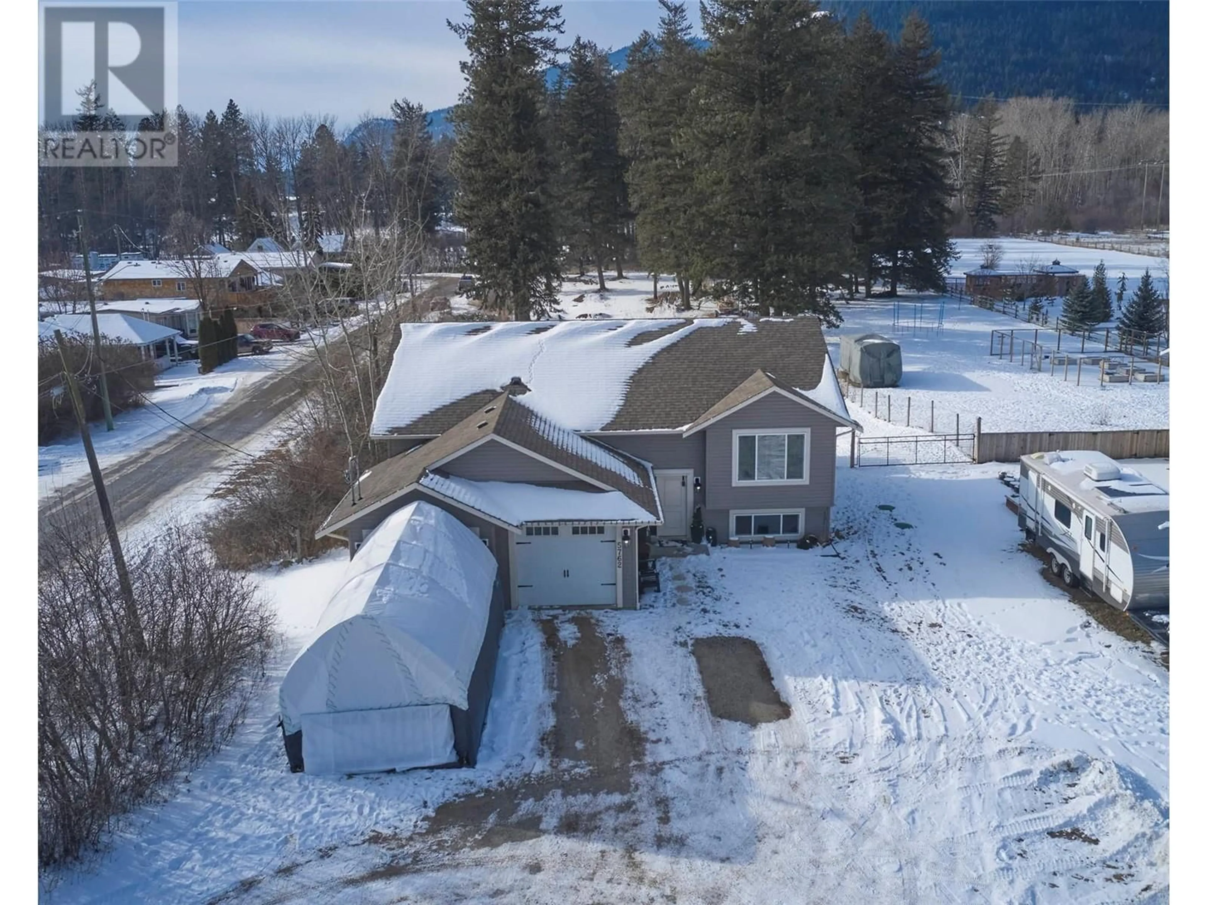 A pic from outside/outdoor area/front of a property/back of a property/a pic from drone, unknown for 5762 Tuktakamin Road, Falkland British Columbia V0E1W0