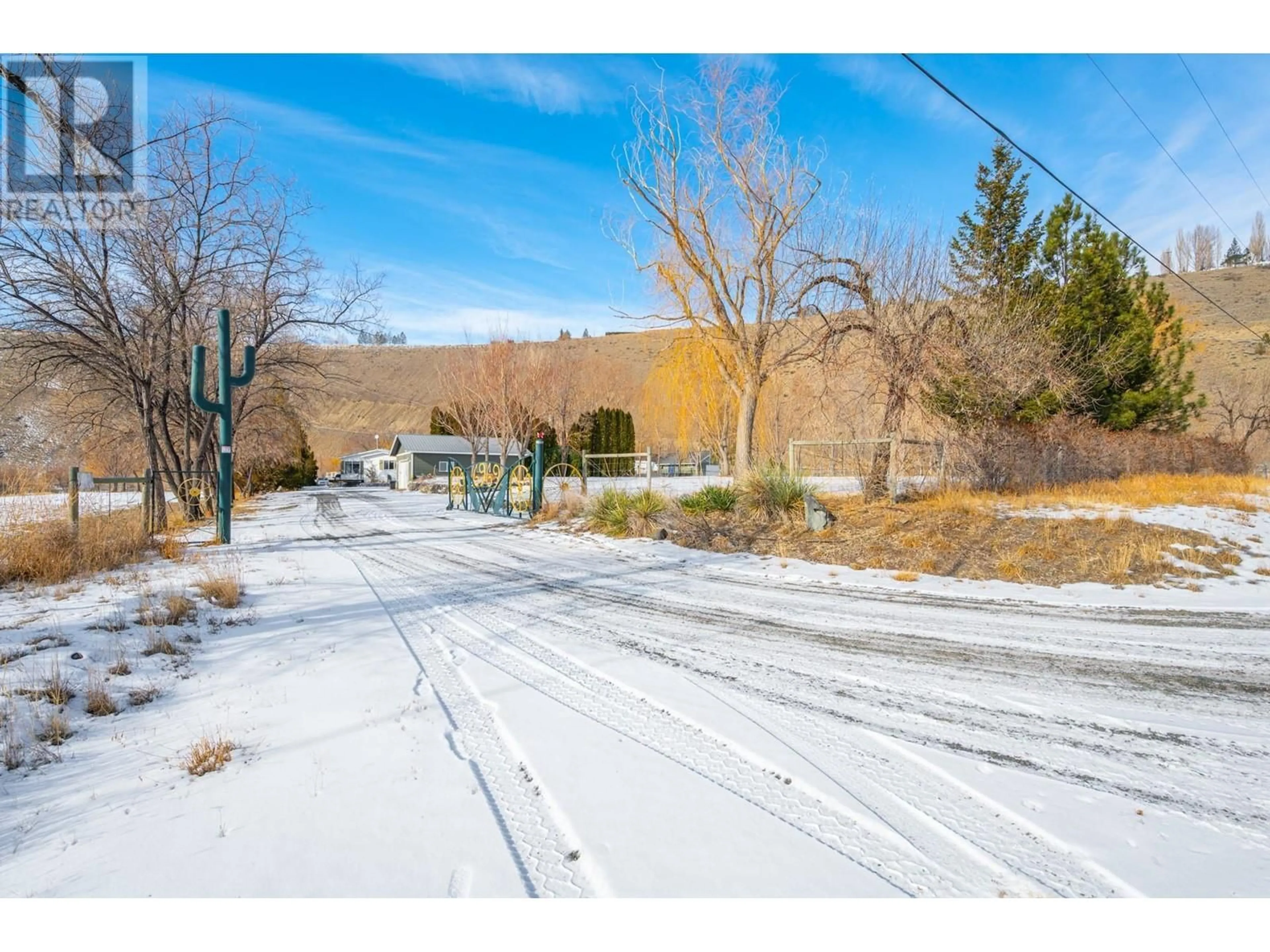 A pic from outside/outdoor area/front of a property/back of a property/a pic from drone, street for 6969 Thompson River Drive, Kamloops British Columbia V0K2P0