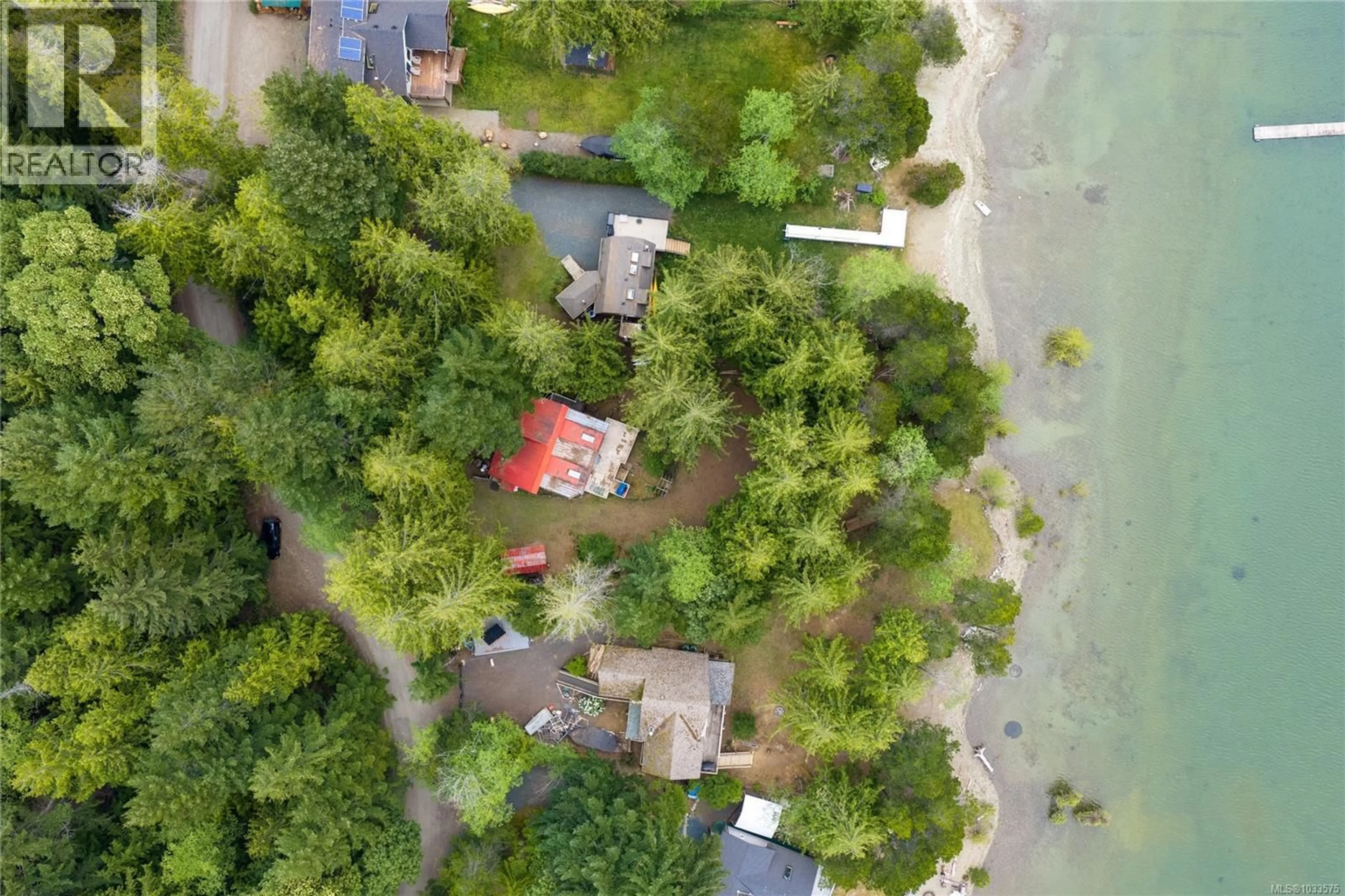 A pic from outside/outdoor area/front of a property/back of a property/a pic from drone, water/lake/river/ocean view for 3144 BAY ROAD, Qualicum Beach British Columbia V9K2L7