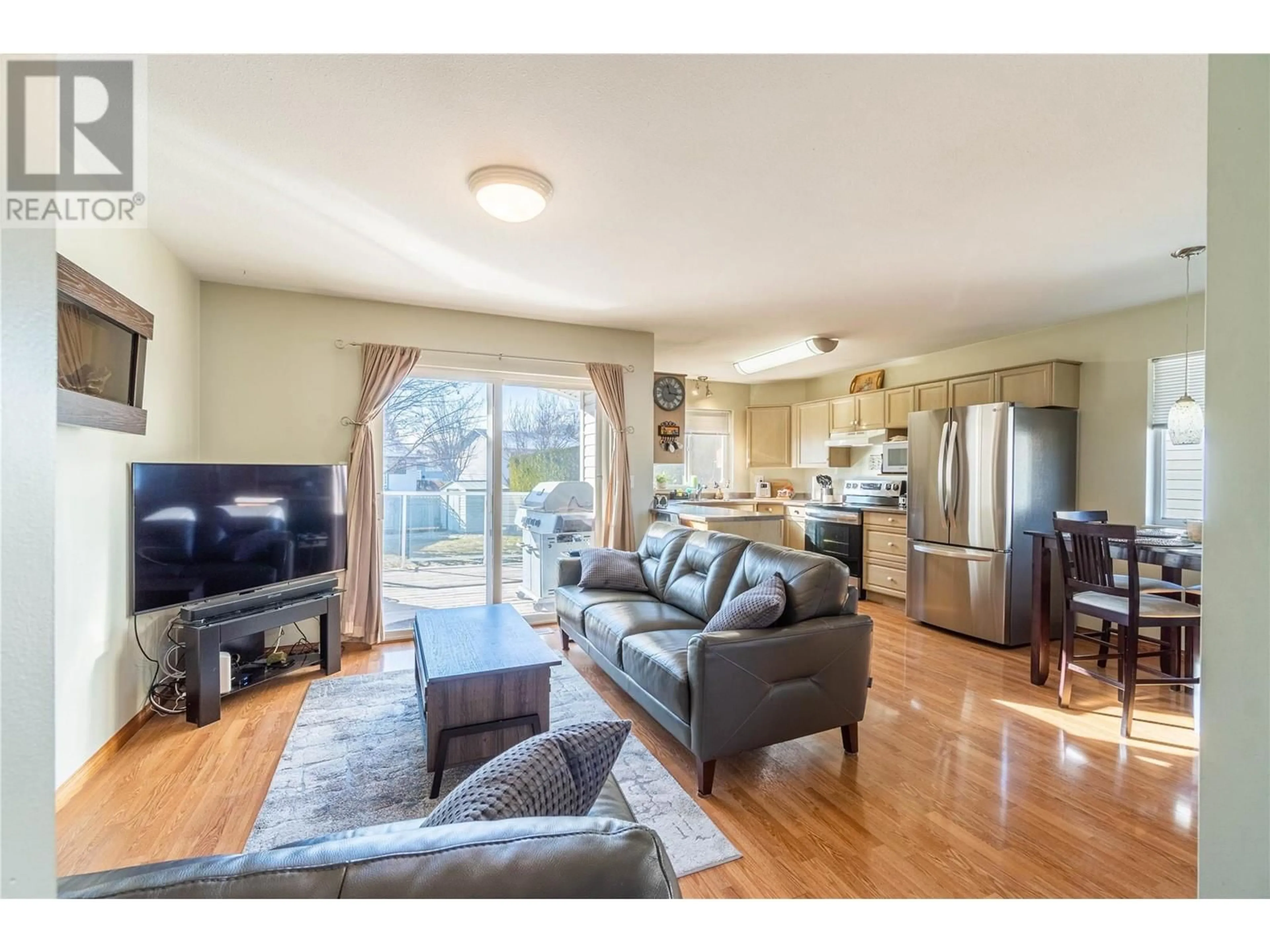 Living room with furniture, wood/laminate floor for 777 McArthur Drive, Kamloops British Columbia V2B8L9