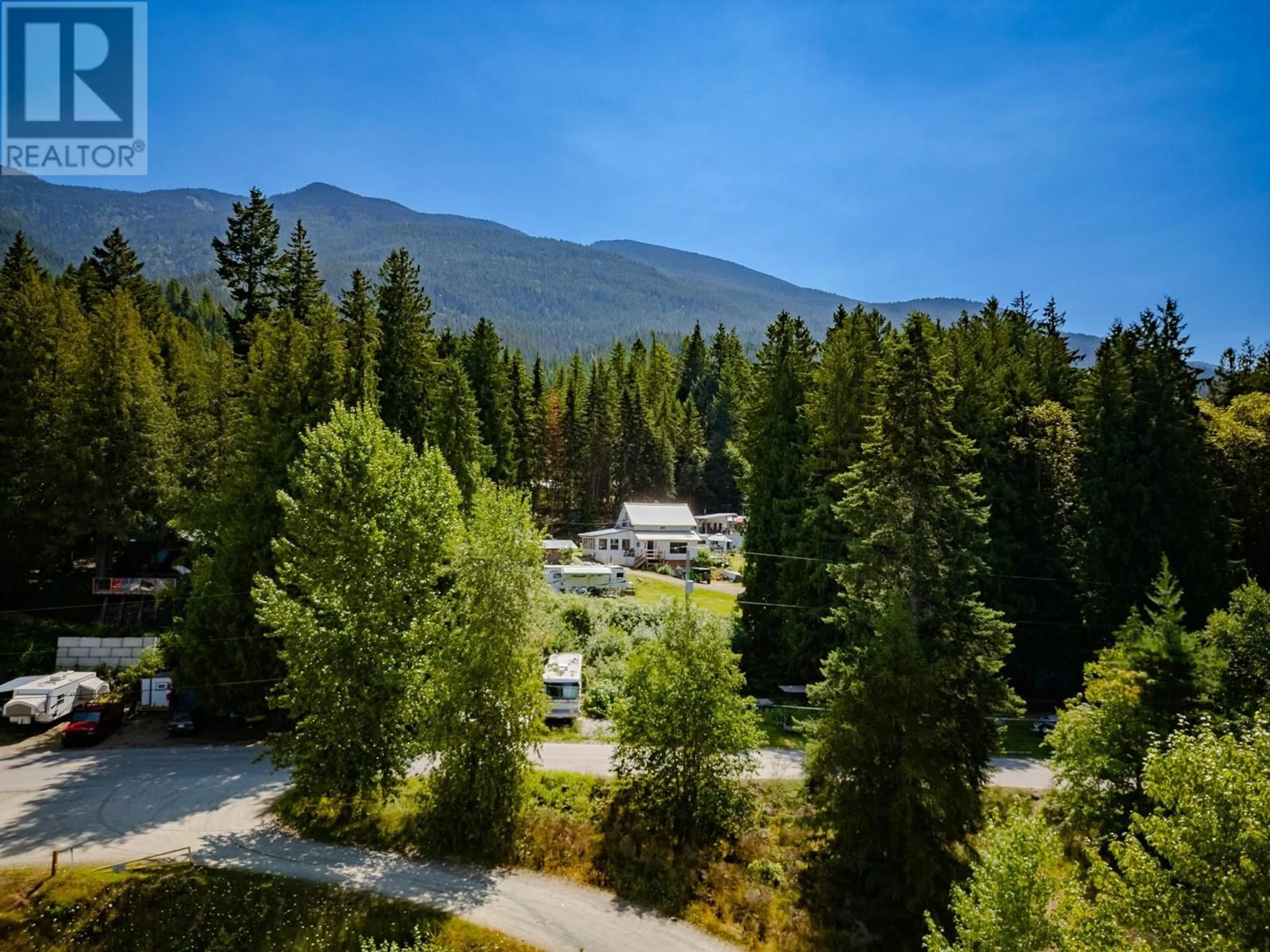 A pic from outside/outdoor area/front of a property/back of a property/a pic from drone, mountain view for 1766 RIONDEL  N Road, Riondel British Columbia V0B2B0