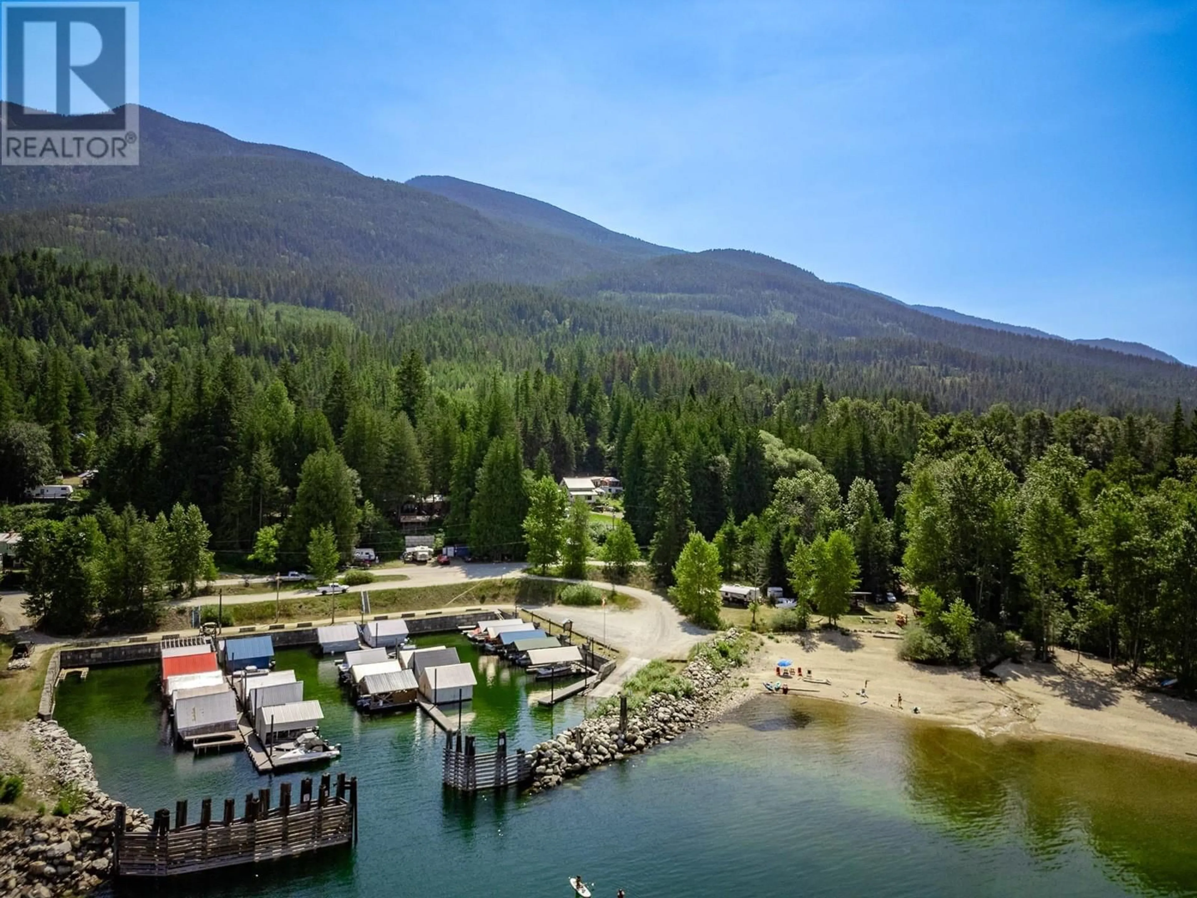 A pic from outside/outdoor area/front of a property/back of a property/a pic from drone, water/lake/river/ocean view for 1766 RIONDEL  N Road, Riondel British Columbia V0B2B0