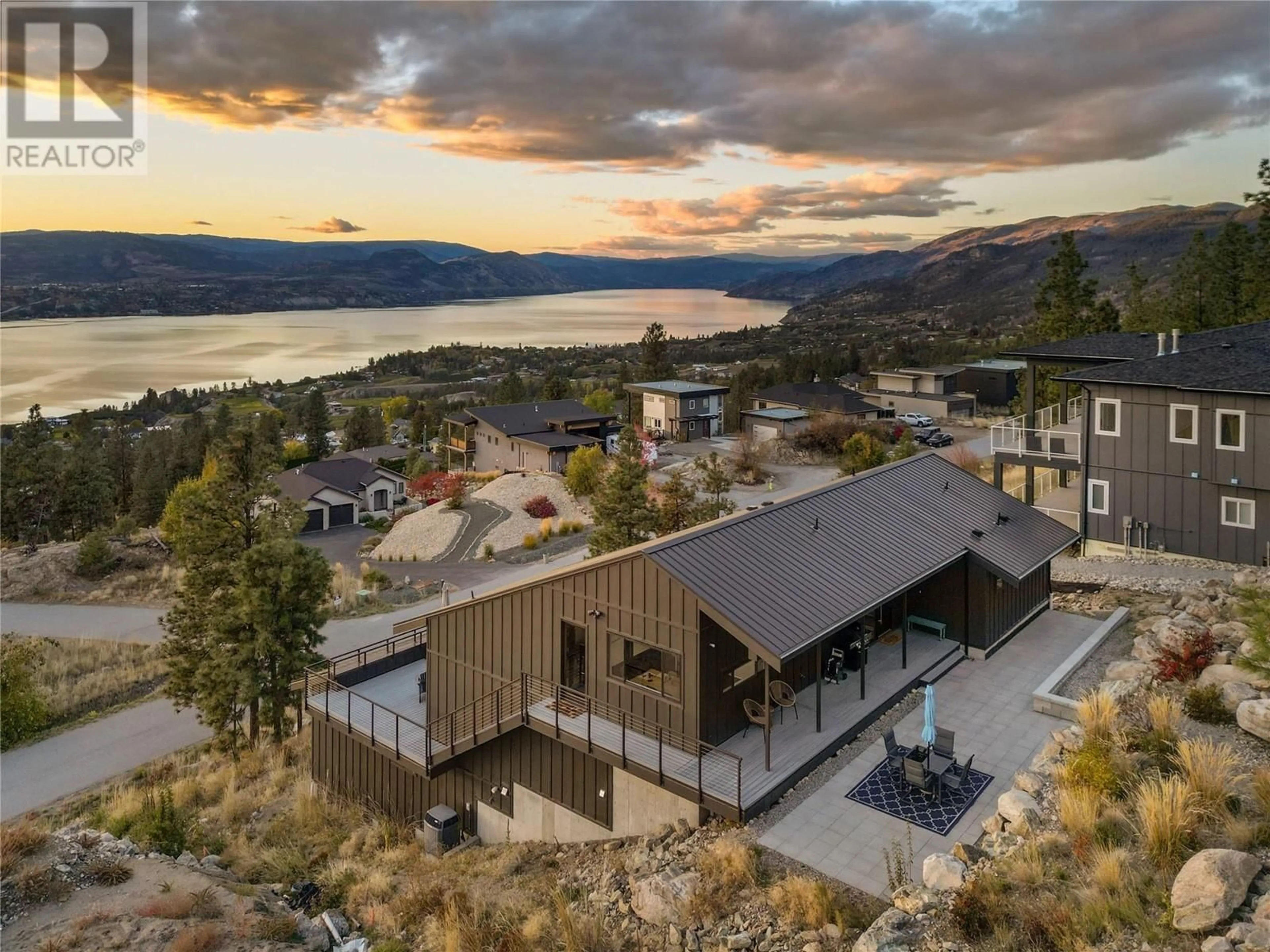 A pic from outside/outdoor area/front of a property/back of a property/a pic from drone, water/lake/river/ocean view for 2710 WORKMAN Place, Naramata British Columbia V0H1N0