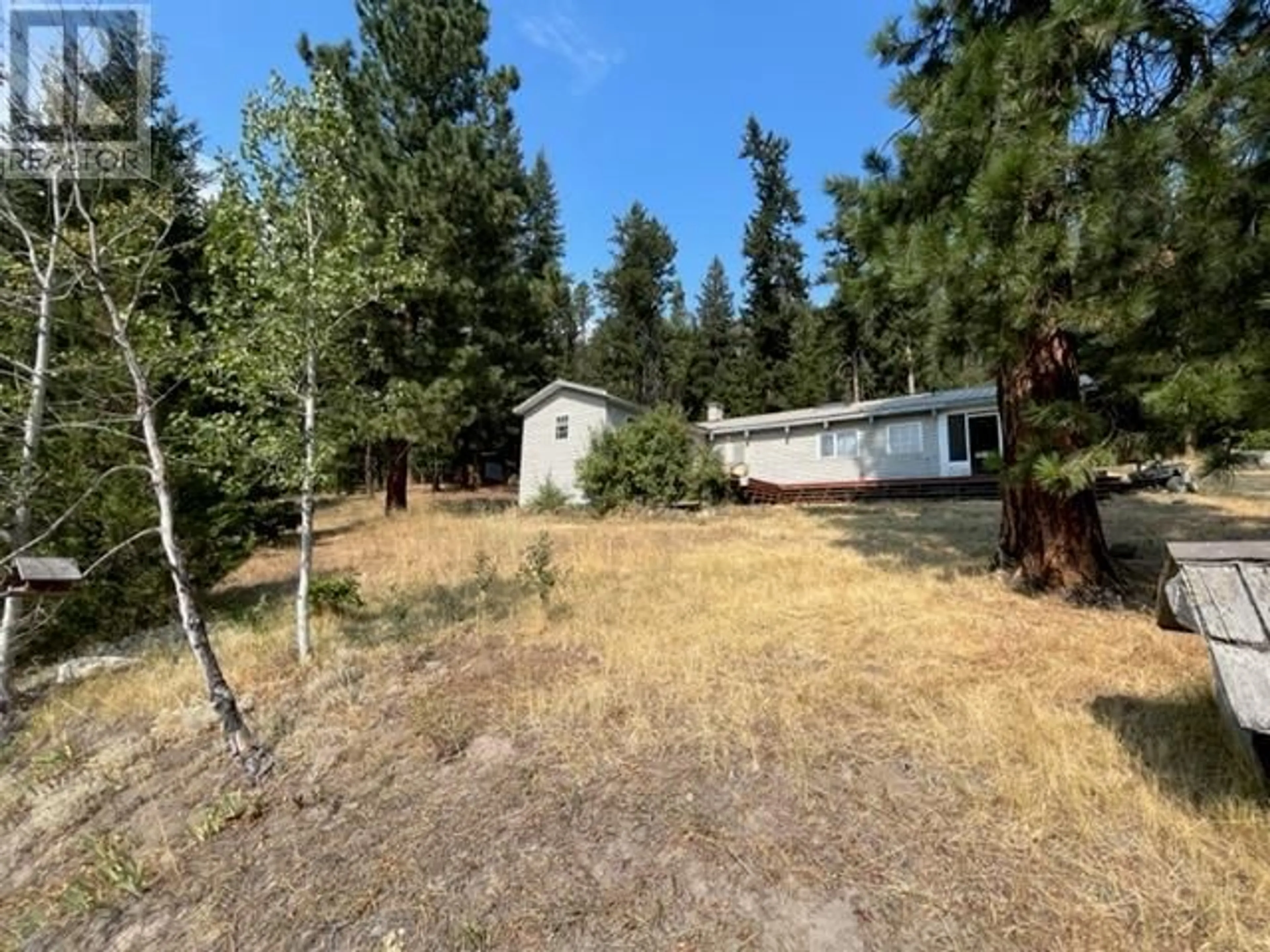 A pic from outside/outdoor area/front of a property/back of a property/a pic from drone, forest/trees view for 1453 Summers Creek Road, Princeton British Columbia V0X1W0