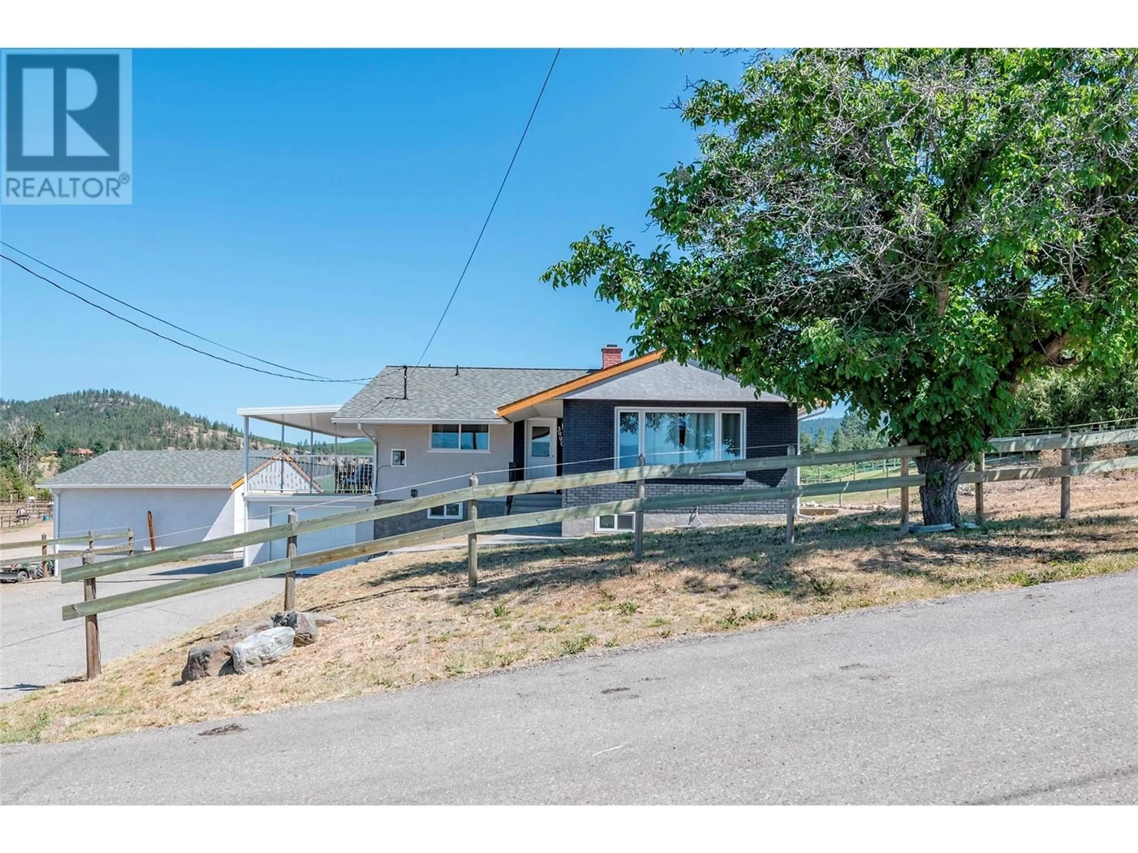 A pic from outside/outdoor area/front of a property/back of a property/a pic from drone, water/lake/river/ocean view for 3990 Senger Road, Kelowna British Columbia V1W4S8