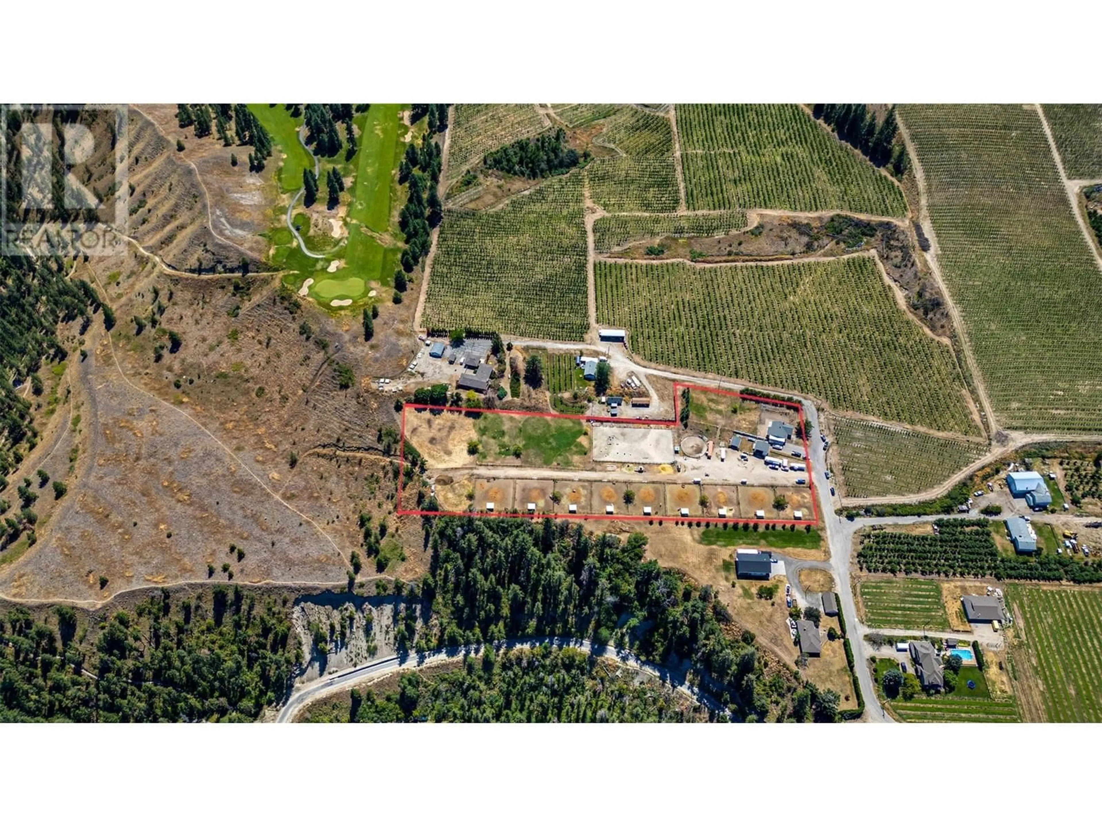 A pic from outside/outdoor area/front of a property/back of a property/a pic from drone, street for 3990 Senger Road, Kelowna British Columbia V1W4S8