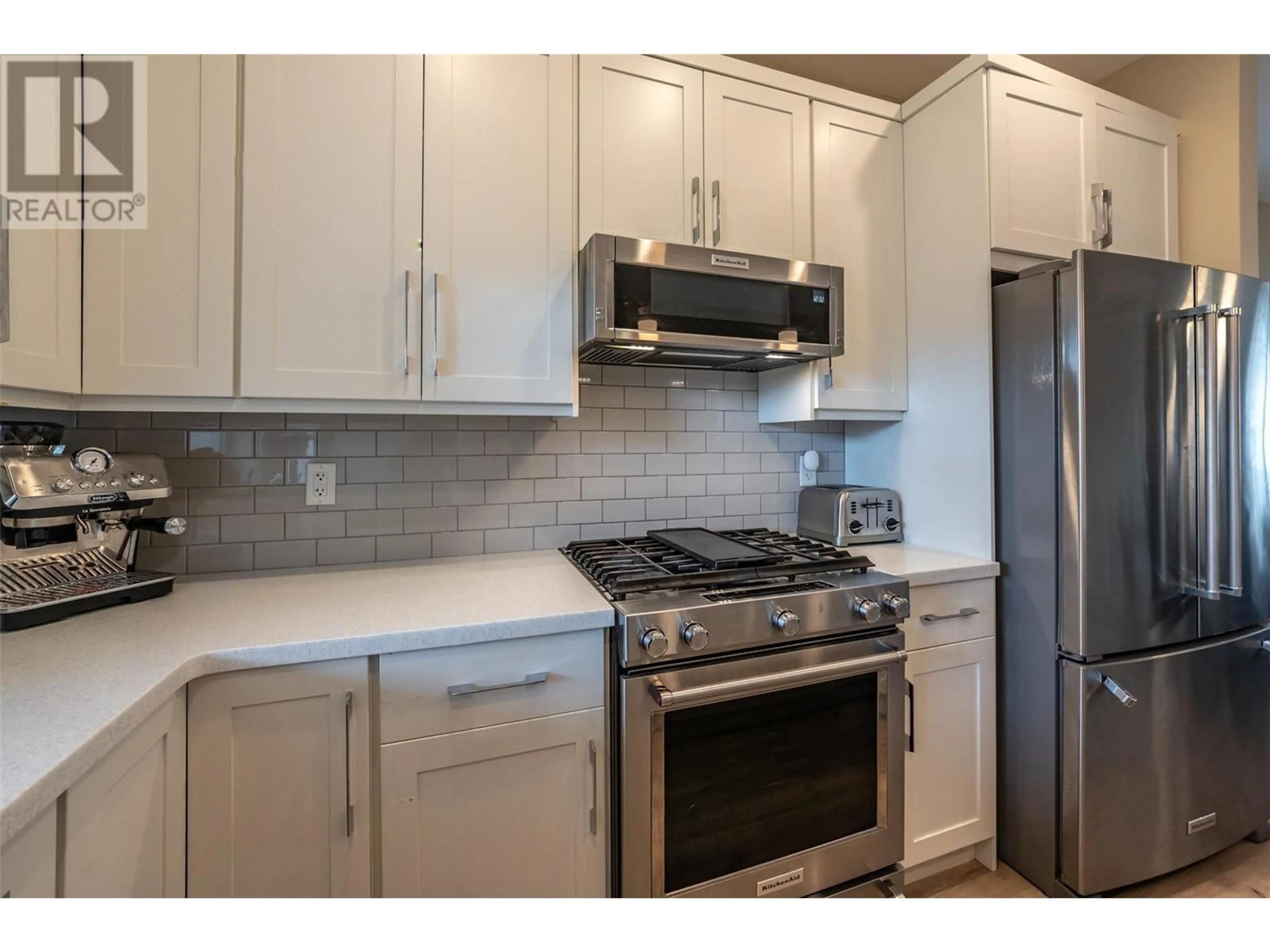 Standard kitchen, ceramic/tile floor for 651 Braid Street Unit# 101, Penticton British Columbia V2A4Y6