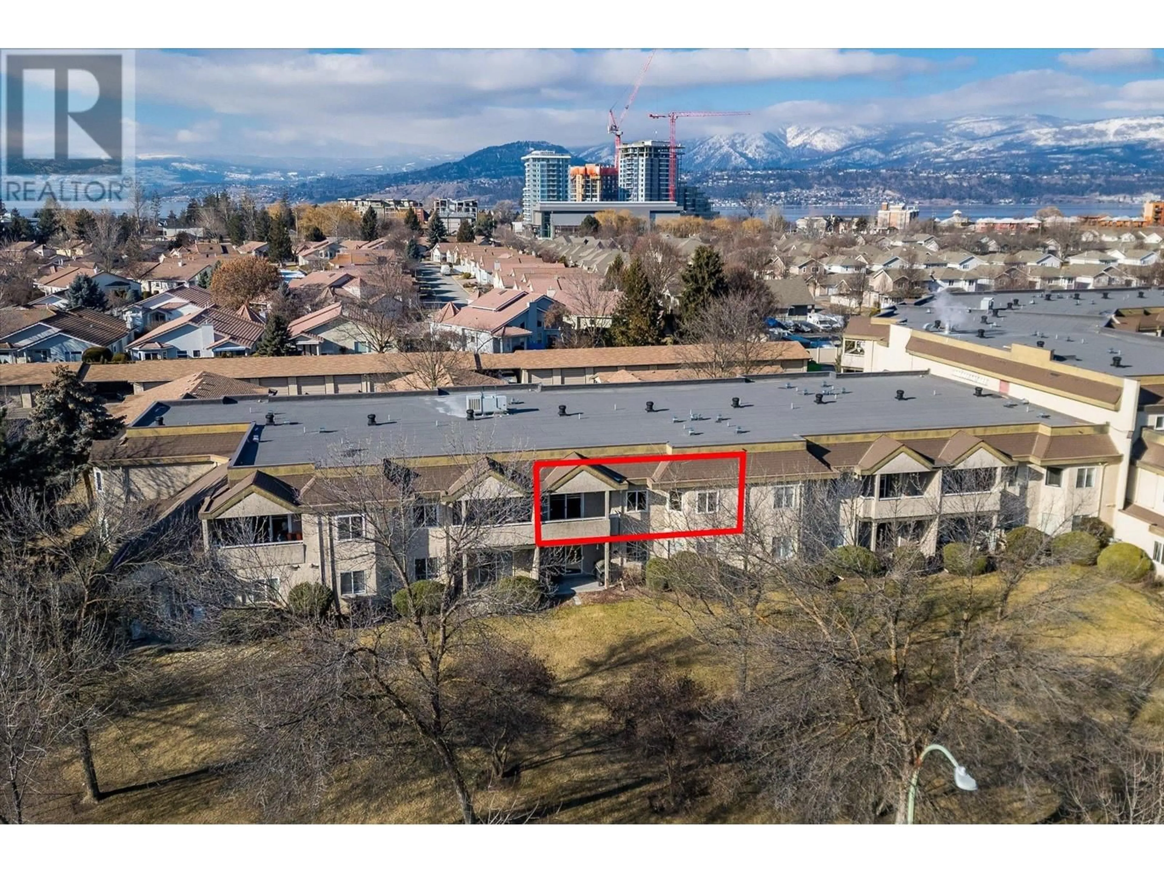A pic from outside/outdoor area/front of a property/back of a property/a pic from drone, mountain view for 275 - 3854 GORDON DRIVE, Kelowna British Columbia V1W3G4
