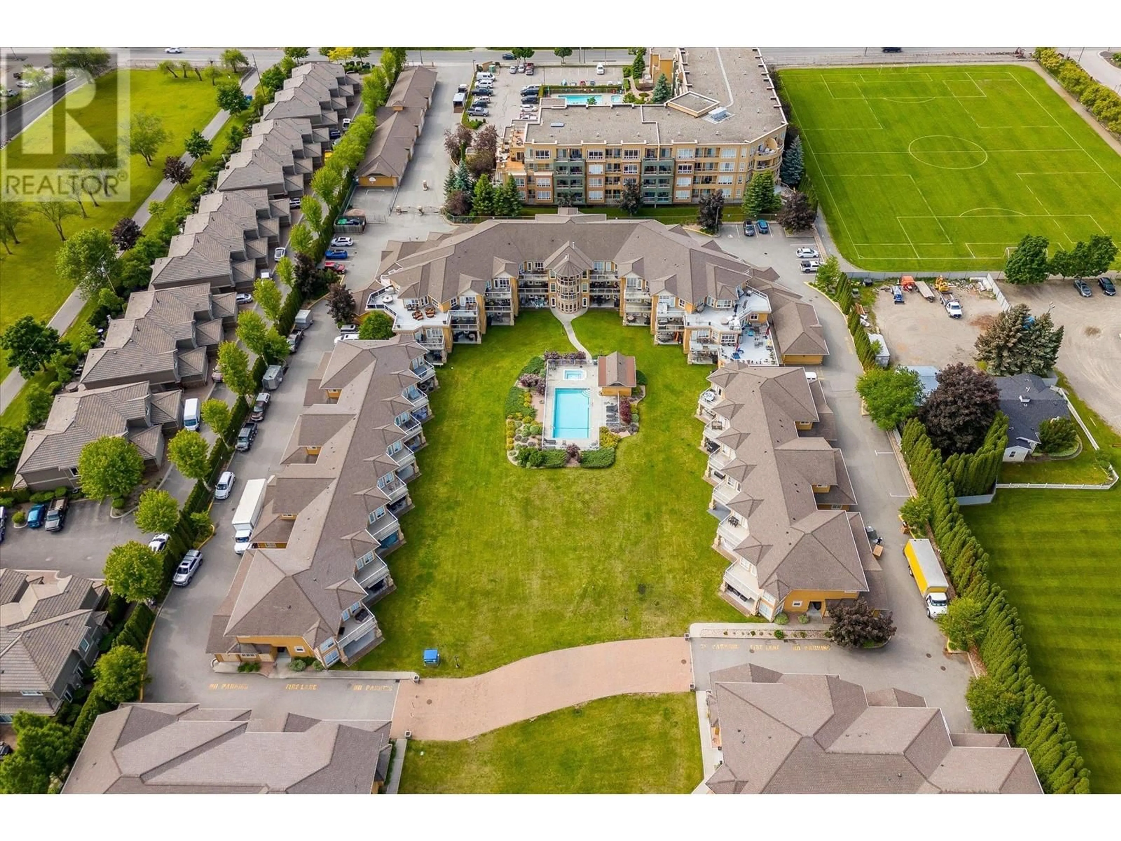 A pic from outside/outdoor area/front of a property/back of a property/a pic from drone, unknown for 3570 Woodsdale Road Unit# 105, Lake Country British Columbia V4V1Y9