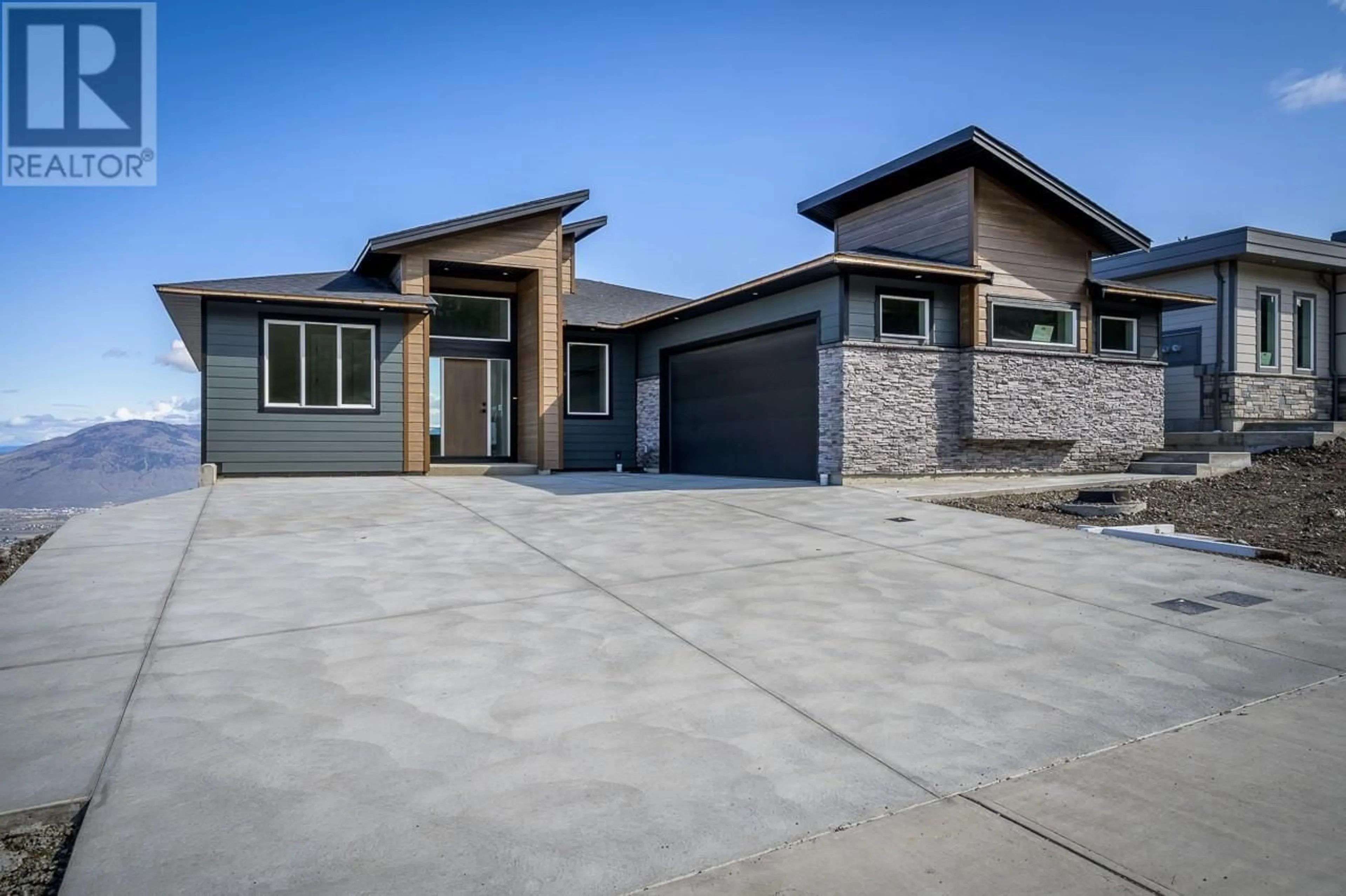 Home with brick exterior material, street for 2138 LINFIELD DRIVE, Kamloops British Columbia V1S0G3