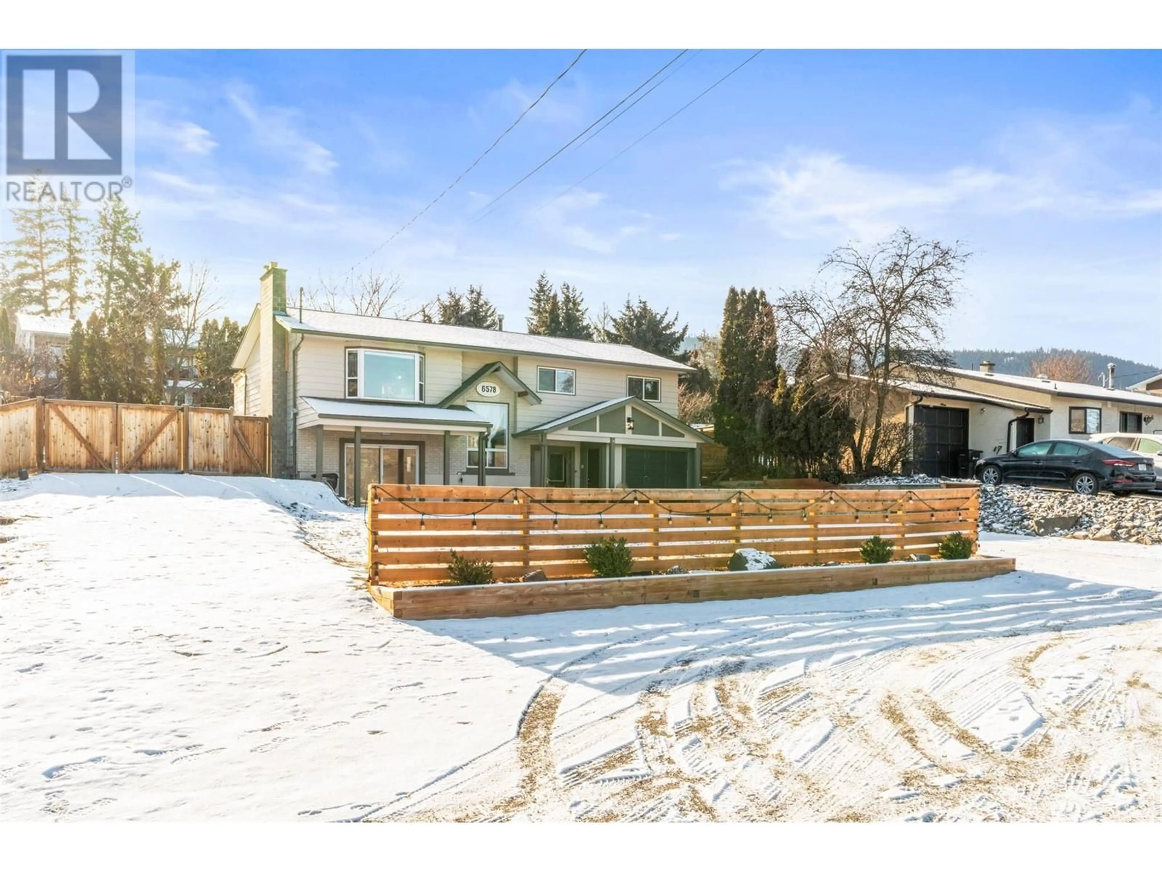 A pic from outside/outdoor area/front of a property/back of a property/a pic from drone, mountain view for 6578 Longacre Drive, Vernon British Columbia V1H1H9