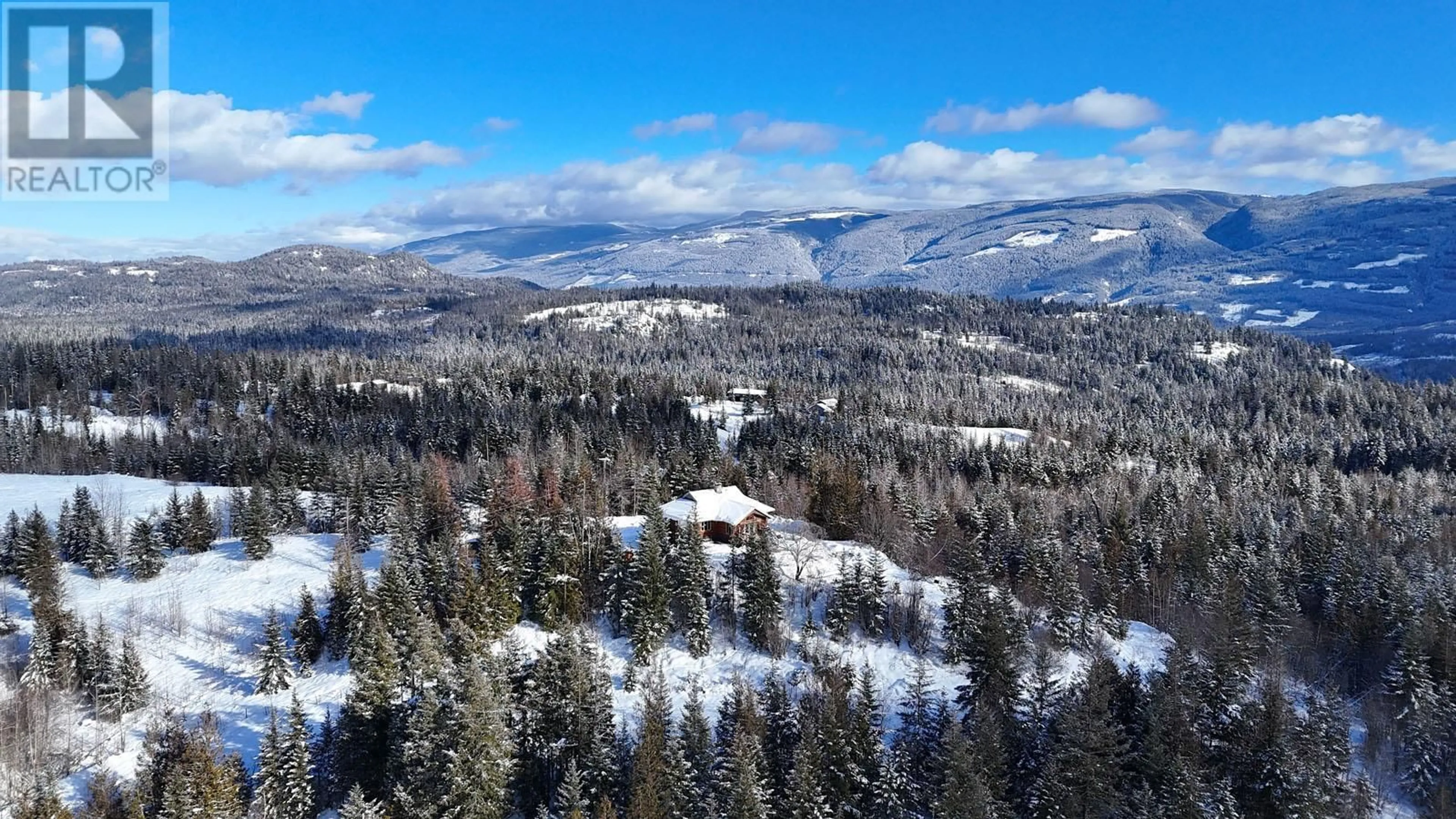 A pic from outside/outdoor area/front of a property/back of a property/a pic from drone, mountain view for 141 EDGAR ROAD, Salmon Arm British Columbia V1E2Y2