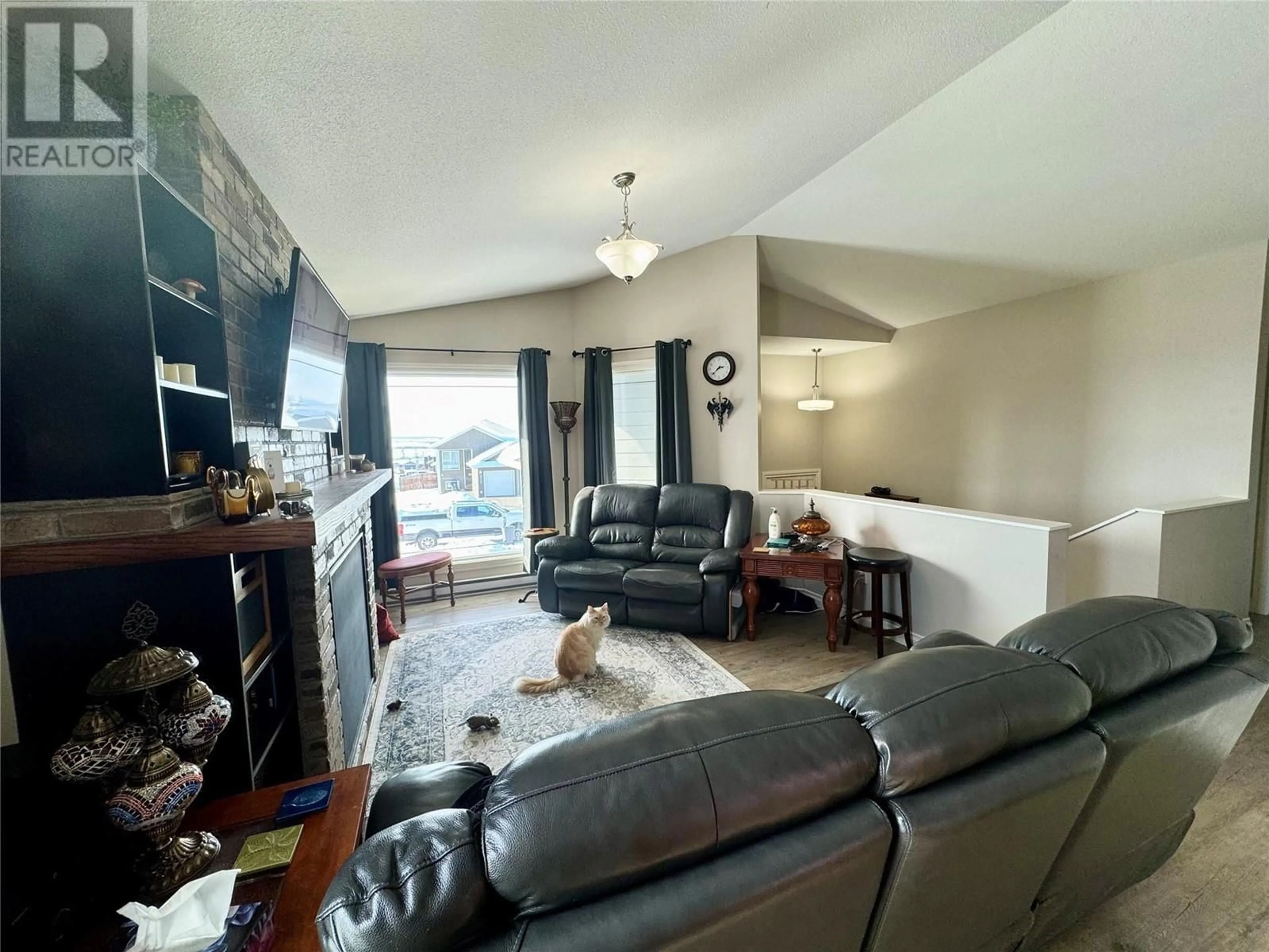 Living room with furniture, unknown for 8216 17A Street, Dawson Creek British Columbia V1G0G6