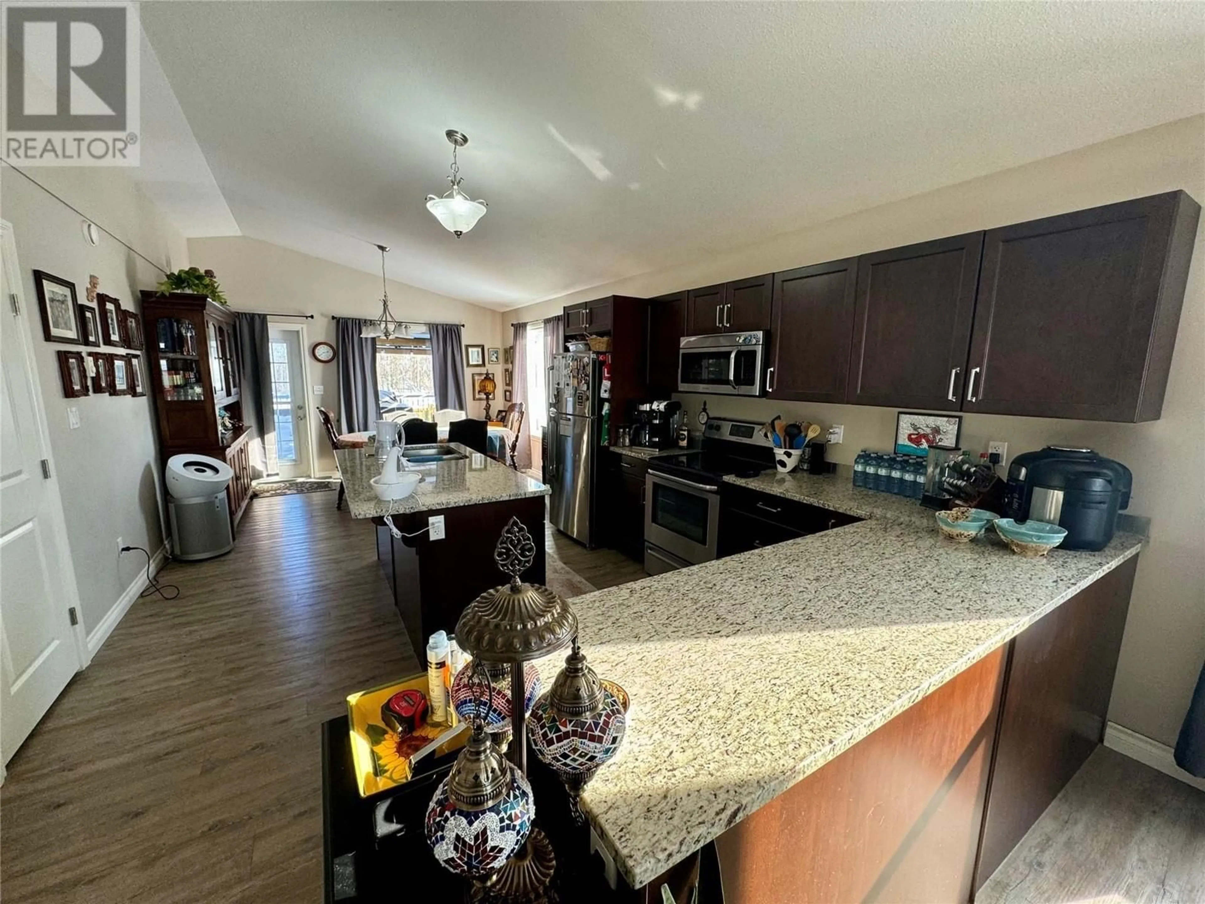 Open concept kitchen, unknown for 8216 17A Street, Dawson Creek British Columbia V1G0G6