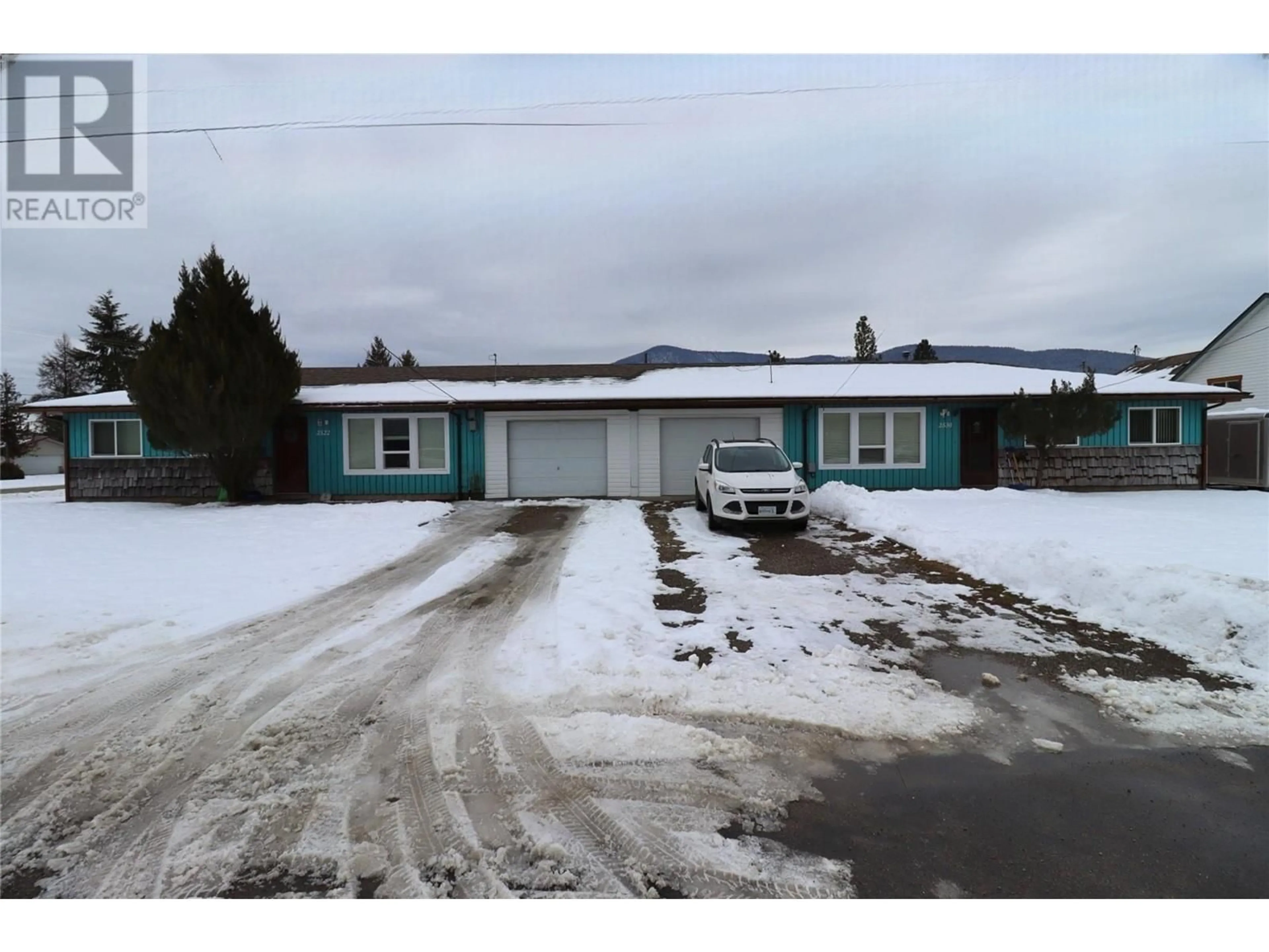 A pic from outside/outdoor area/front of a property/back of a property/a pic from drone, street for 2530 75TH Avenue, Grand Forks British Columbia V0H1H2