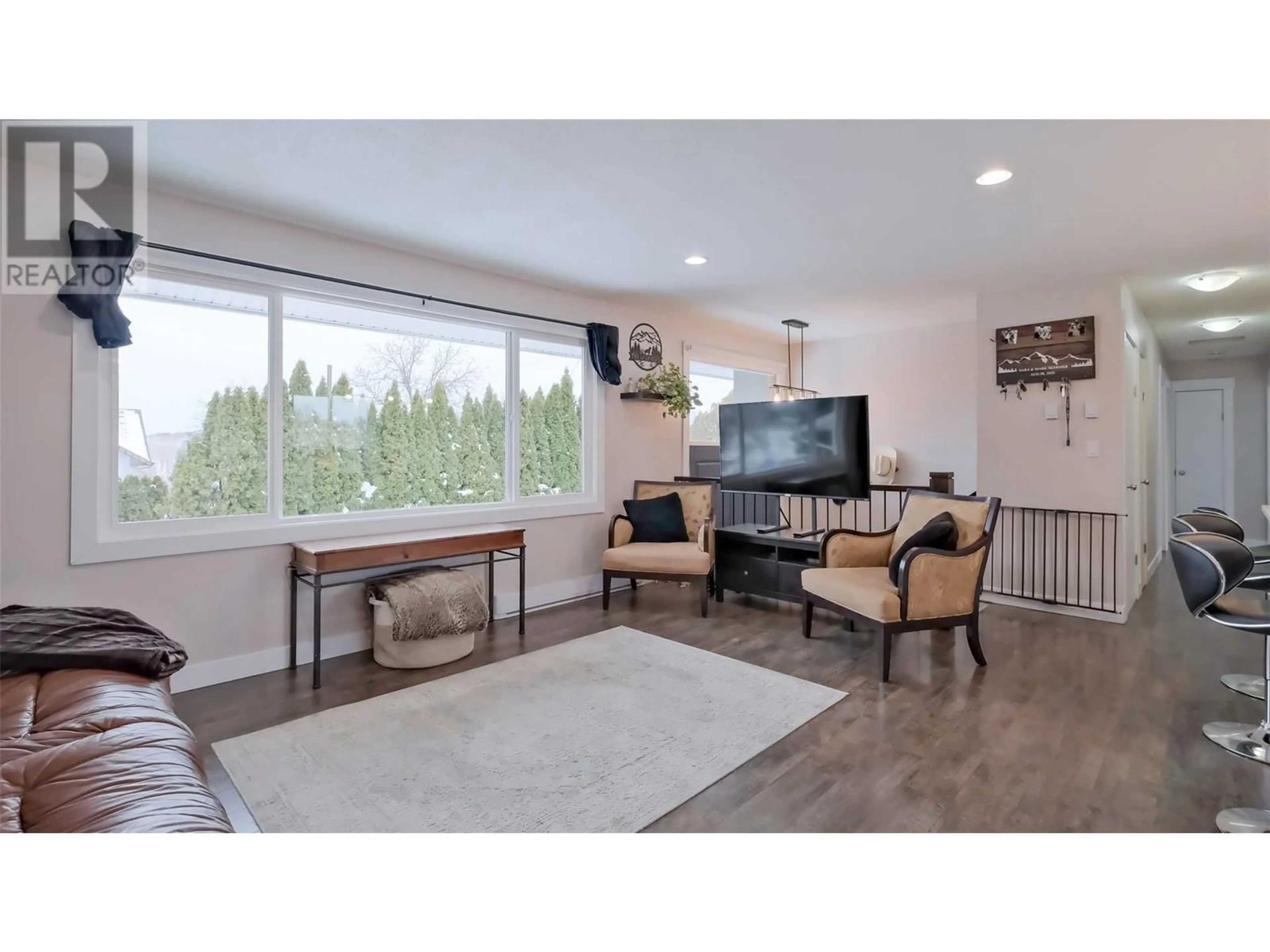 Living room with furniture, unknown for 2486 Sexsmith Road, Kelowna British Columbia V1V2E9