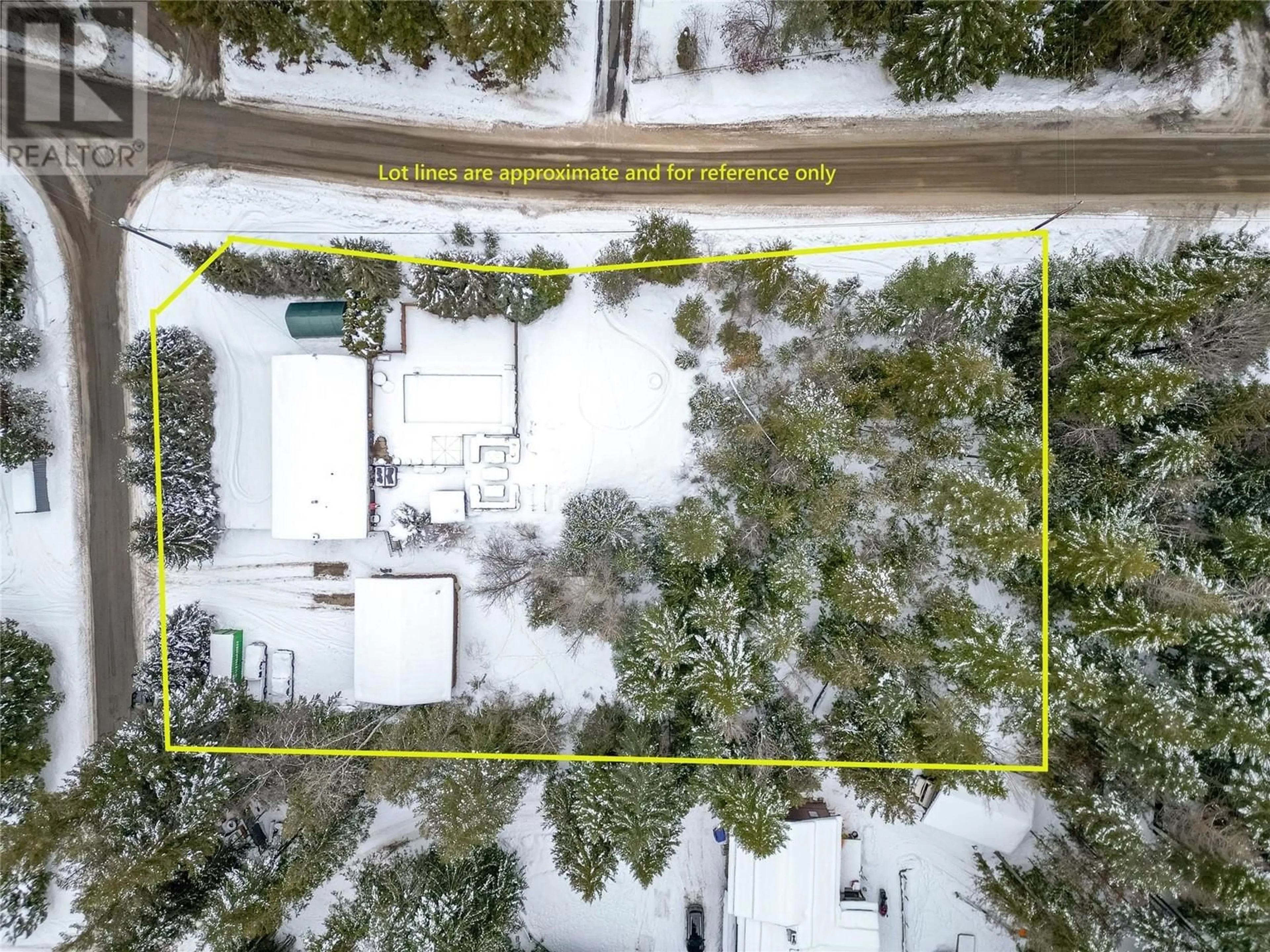 A pic from outside/outdoor area/front of a property/back of a property/a pic from drone, street for 5247 Mayfair Road SE, Salmon Arm British Columbia V1E2P8