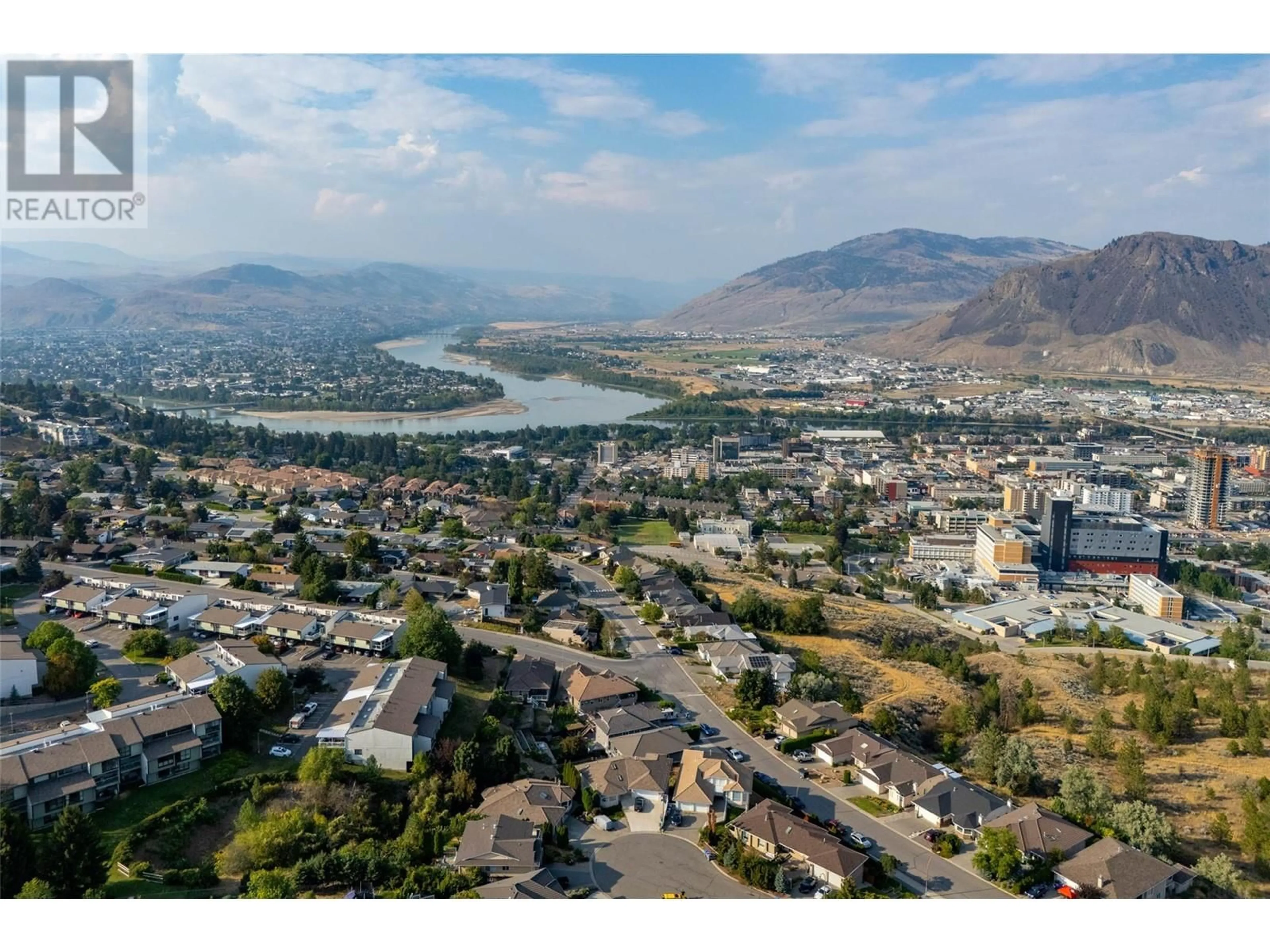 A pic from outside/outdoor area/front of a property/back of a property/a pic from drone, mountain view for 125 Mahood Place, Kamloops British Columbia V2C6P7