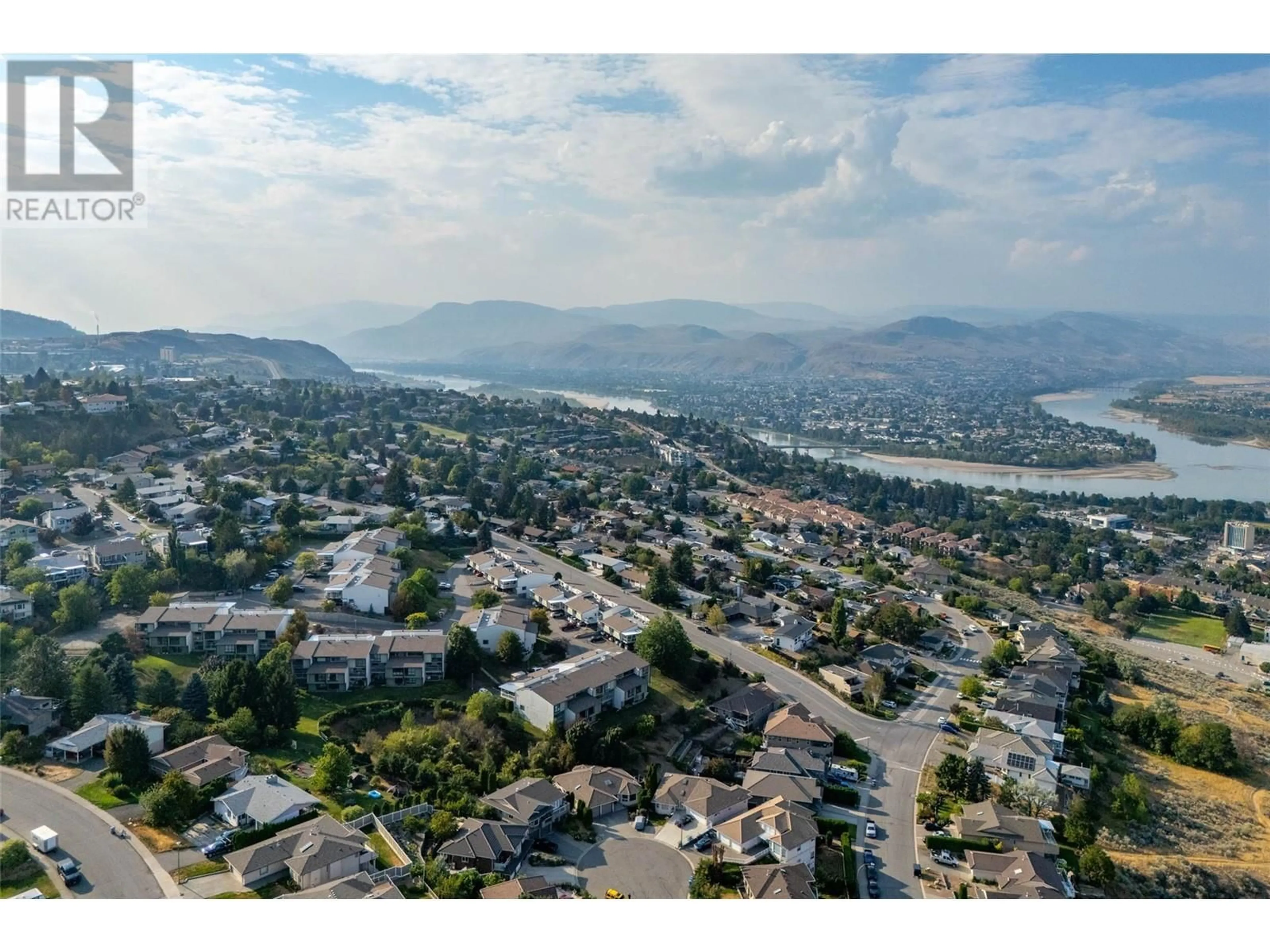 A pic from outside/outdoor area/front of a property/back of a property/a pic from drone, mountain view for 125 Mahood Place, Kamloops British Columbia V2C6P7