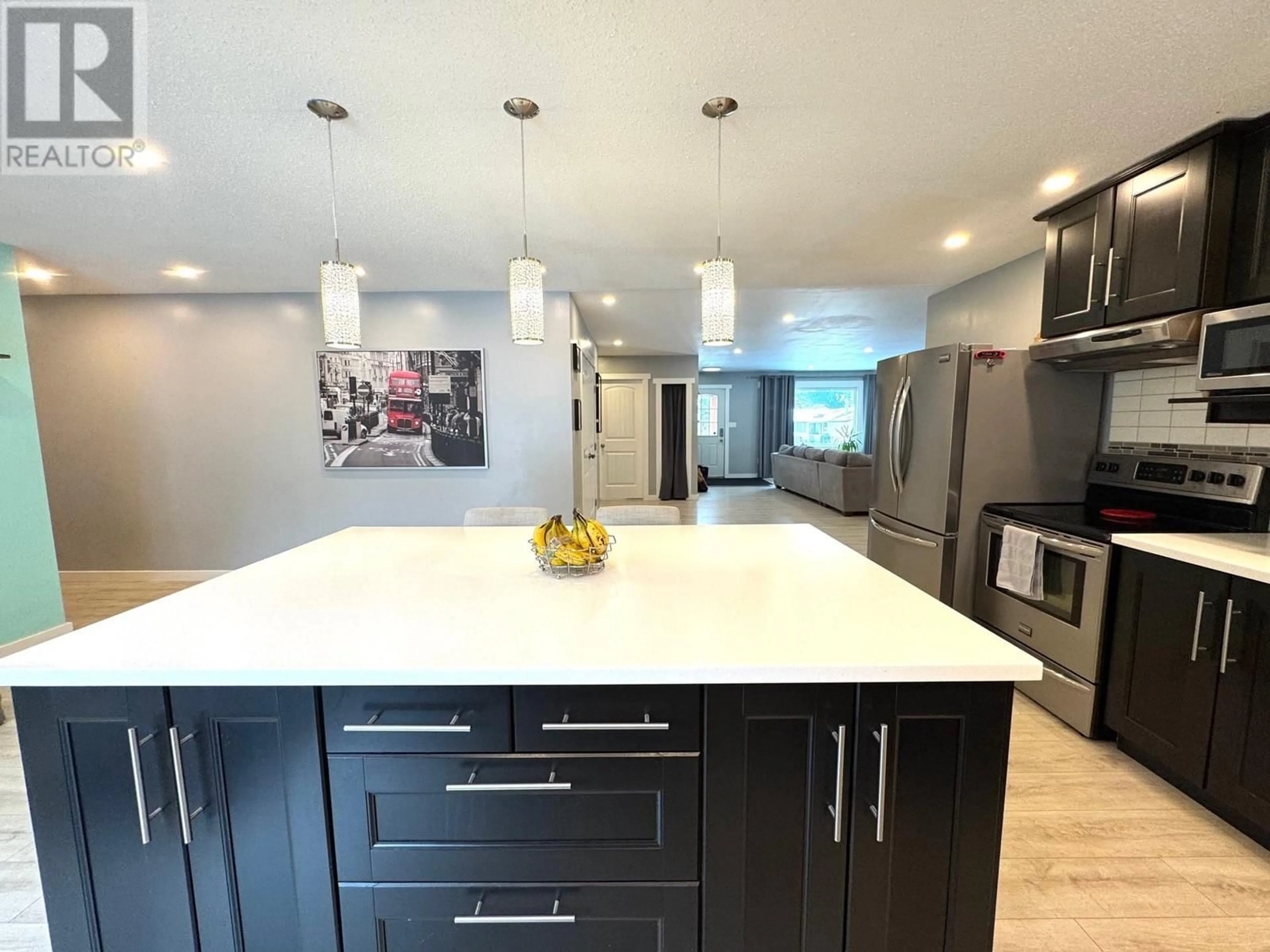 Open concept kitchen, ceramic/tile floor for 2075 Parker Drive, Merritt British Columbia V1K1J2