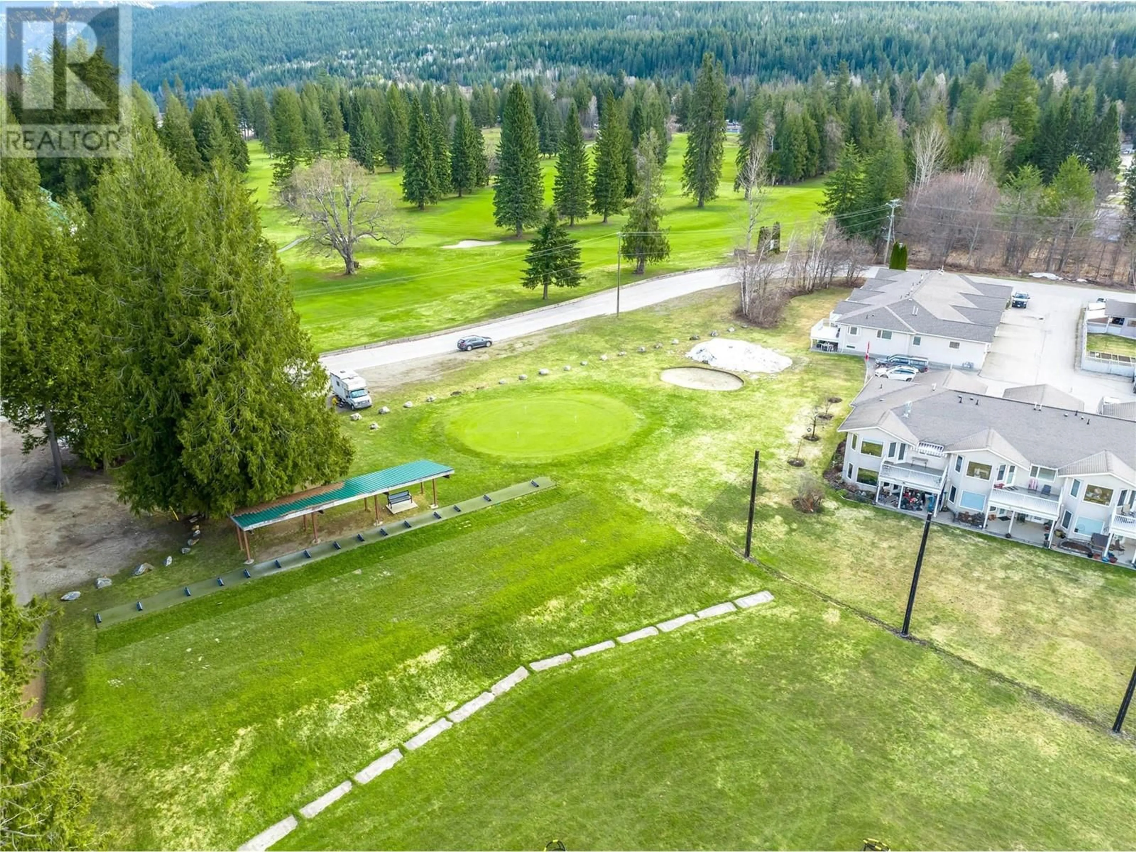 A pic from outside/outdoor area/front of a property/back of a property/a pic from drone, mountain view for 3 - 151 COLUMBIA PARK DRIVE, Revelstoke British Columbia V0E2S0