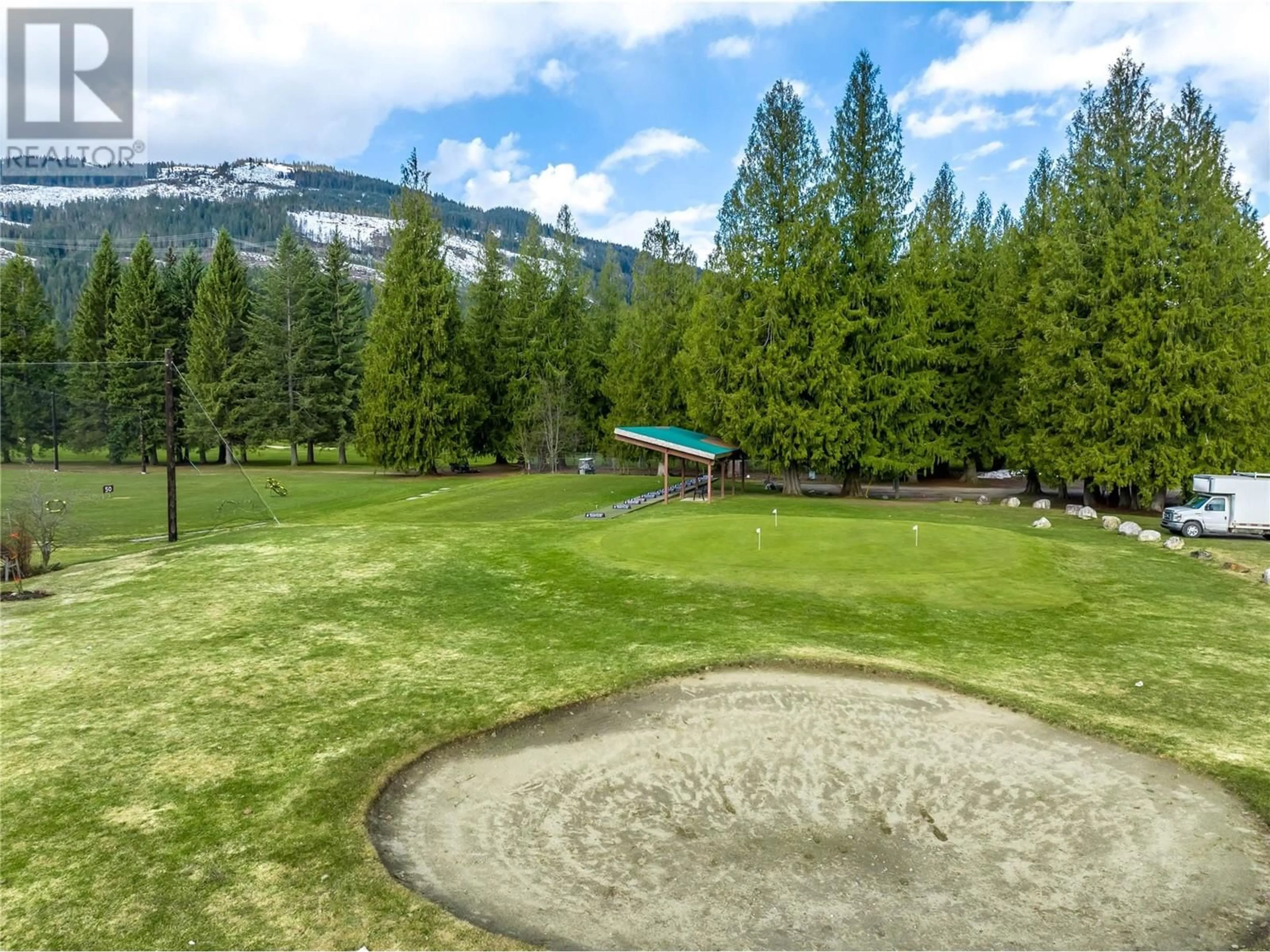 A pic from outside/outdoor area/front of a property/back of a property/a pic from drone, mountain view for 3 - 151 COLUMBIA PARK DRIVE, Revelstoke British Columbia V0E2S0