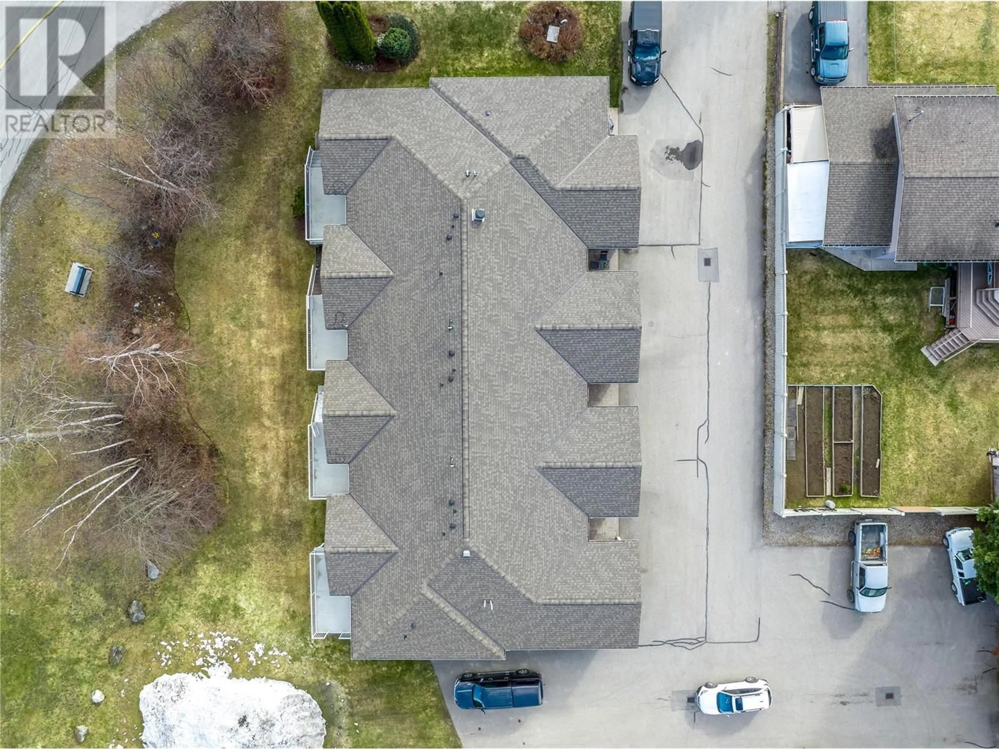 A pic from outside/outdoor area/front of a property/back of a property/a pic from drone, street for 151 Columbia Park Drive Unit# 3, Revelstoke British Columbia V0E2S0