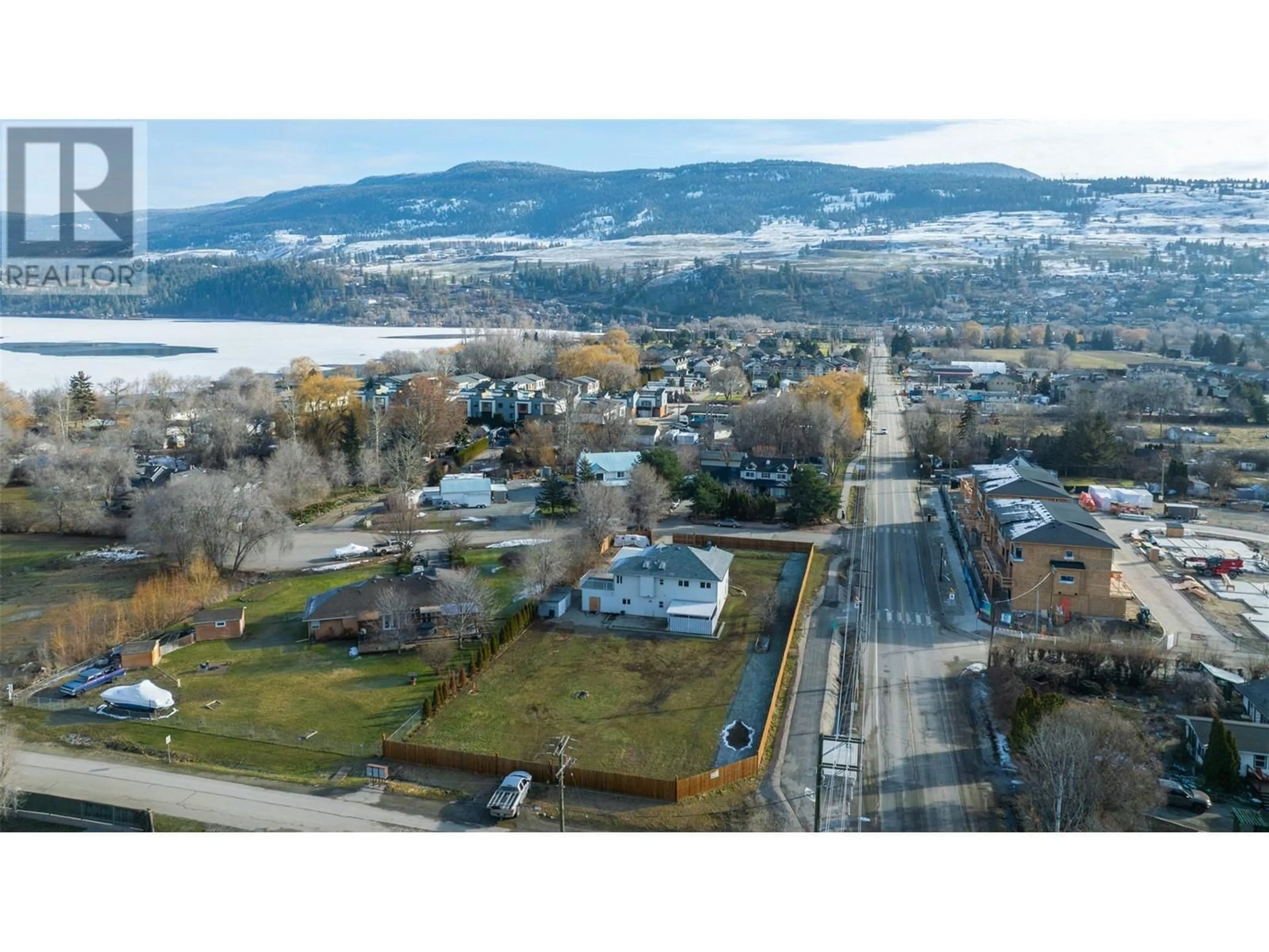 A pic from outside/outdoor area/front of a property/back of a property/a pic from drone, mountain view for 11506 Turtle Bay Court, Lake Country British Columbia V4V1X9