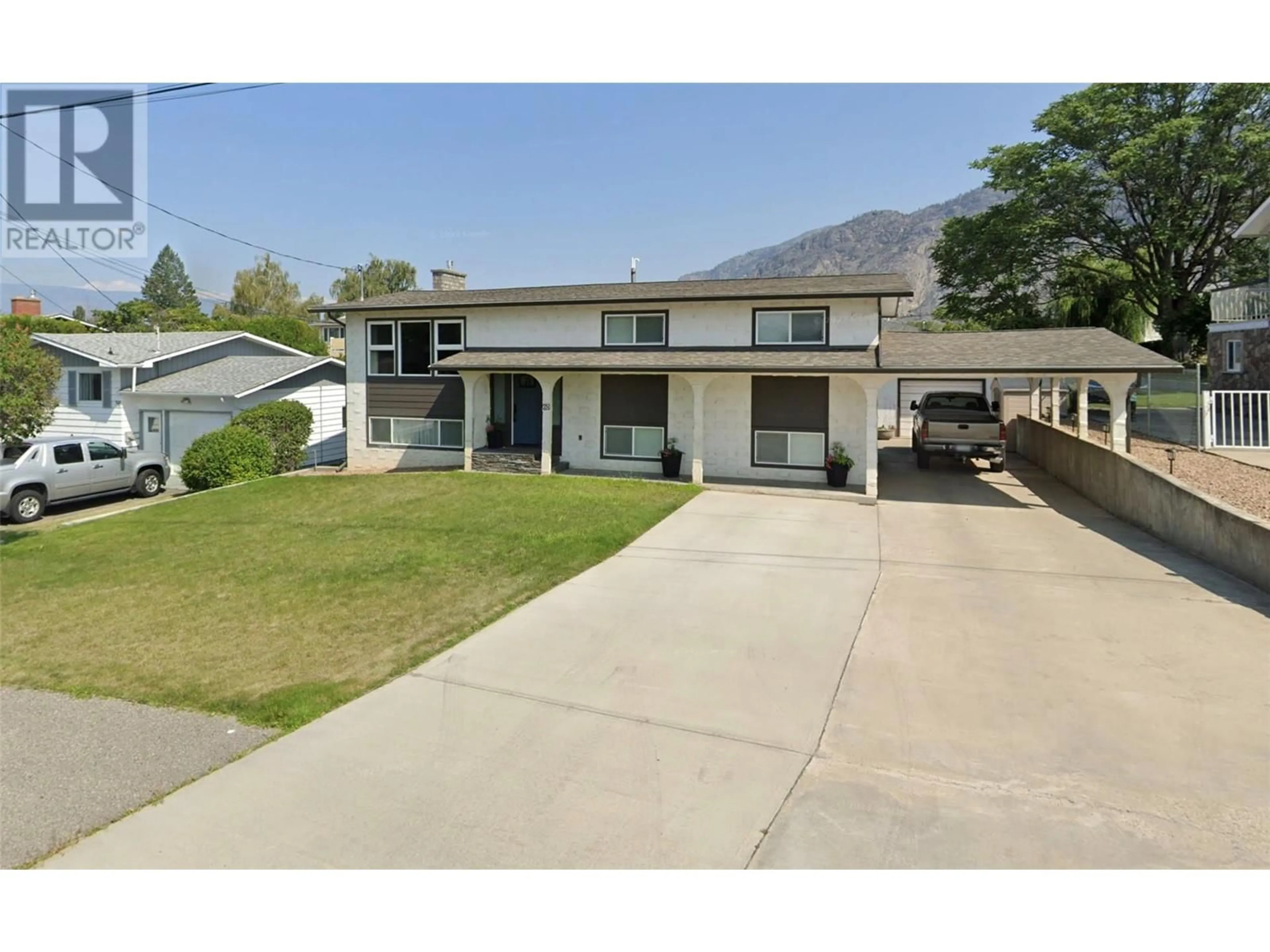 A pic from outside/outdoor area/front of a property/back of a property/a pic from drone, mountain view for 38 WILLOW CRESCENT, Osoyoos British Columbia V0H1V3