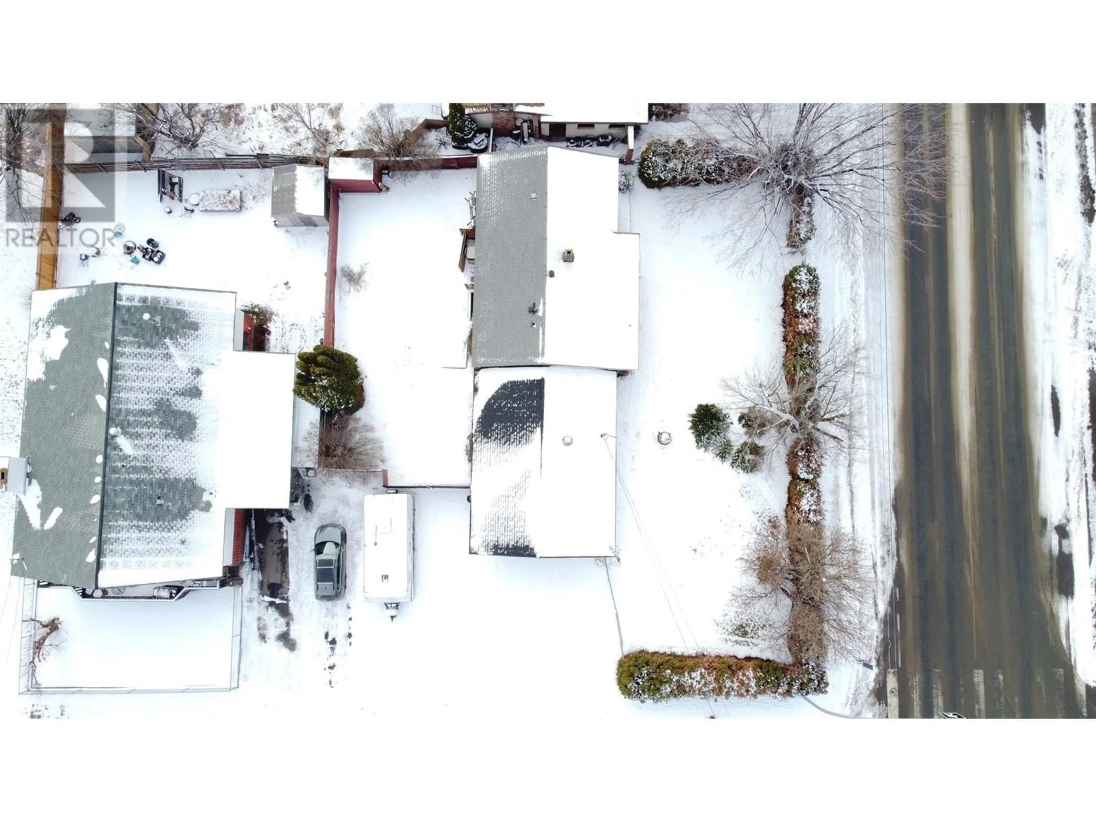 A pic from outside/outdoor area/front of a property/back of a property/a pic from drone, street for 1576 HOUSTON Street, Merritt British Columbia V1K1B2