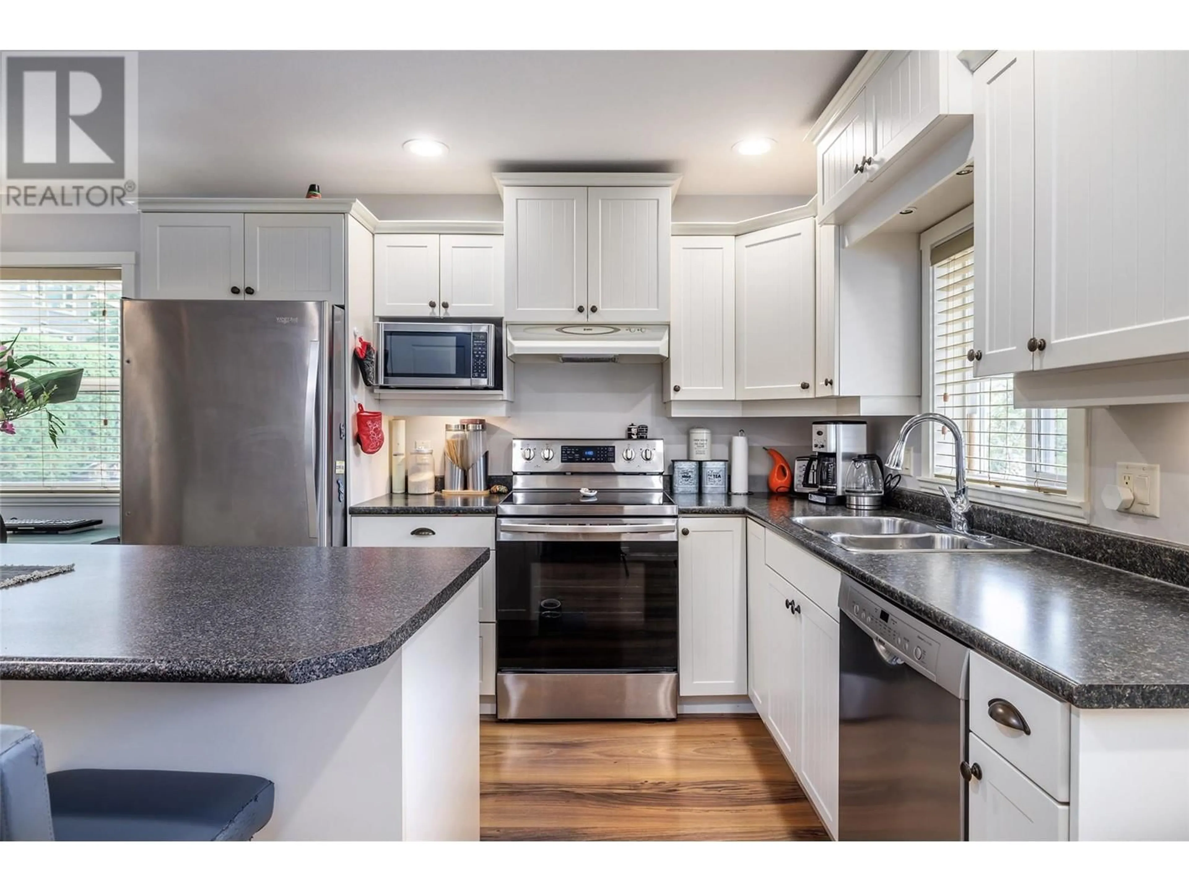 Open concept kitchen, unknown for 1945 Bowes Street, Kelowna British Columbia V1Y3C2