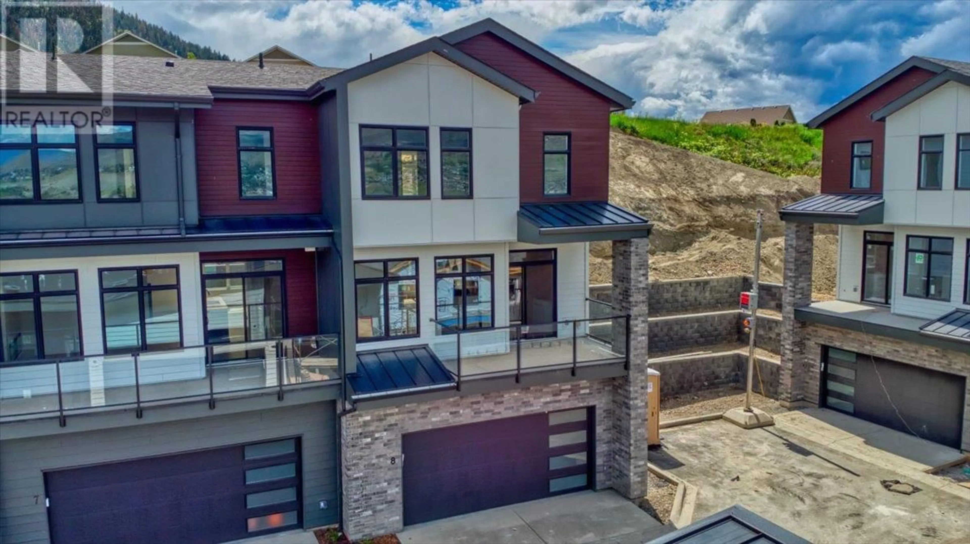 Home with brick exterior material, street for 8 - 7599 KLINGER ROAD, Vernon British Columbia V1H1H4
