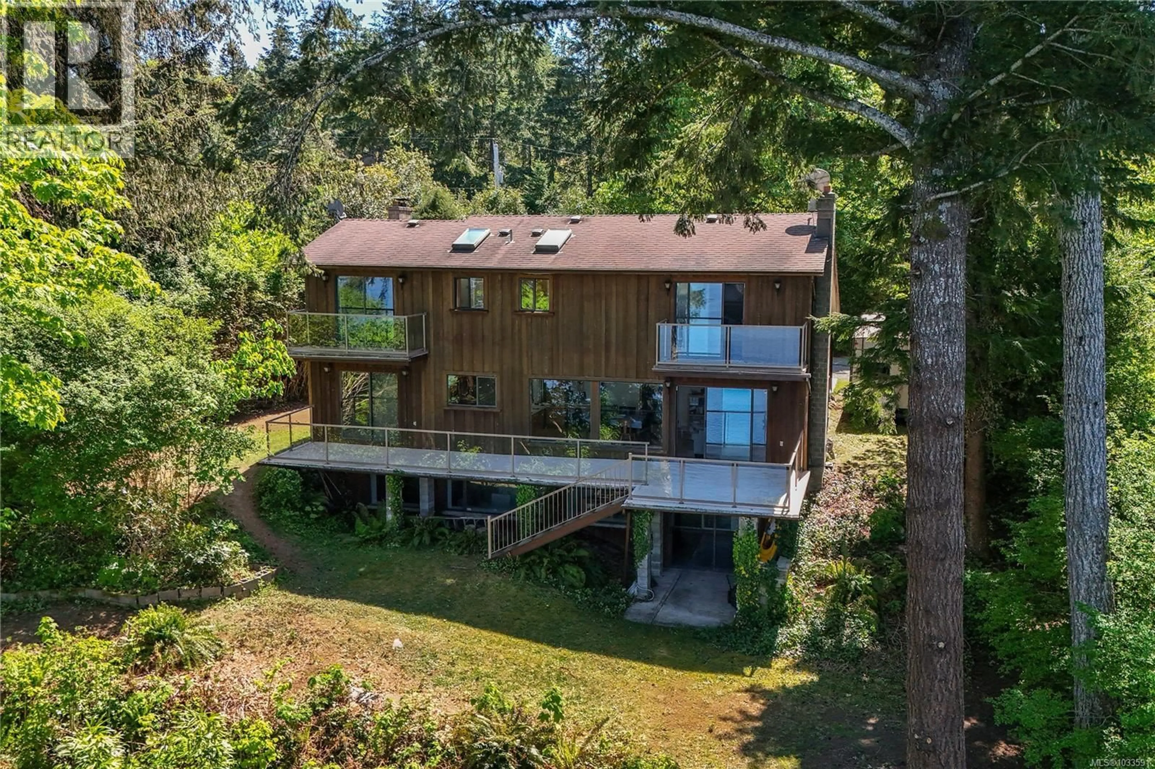 A pic from outside/outdoor area/front of a property/back of a property/a pic from drone, unknown for 5850 RACE POINT ROAD, Campbell River British Columbia V9H1N7