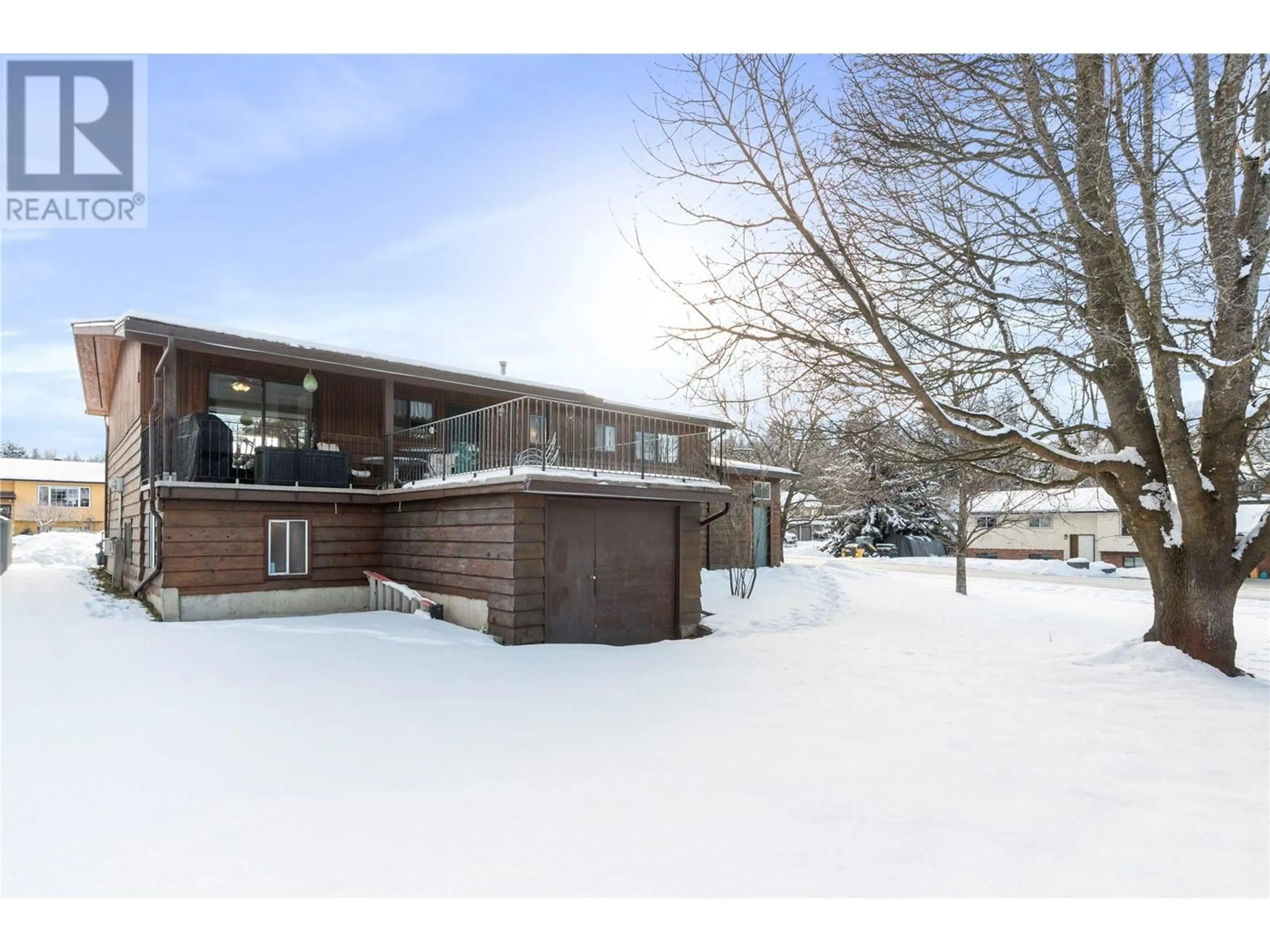 A pic from outside/outdoor area/front of a property/back of a property/a pic from drone, unknown for 121 16 Street NE, Salmon Arm British Columbia V1E1N5