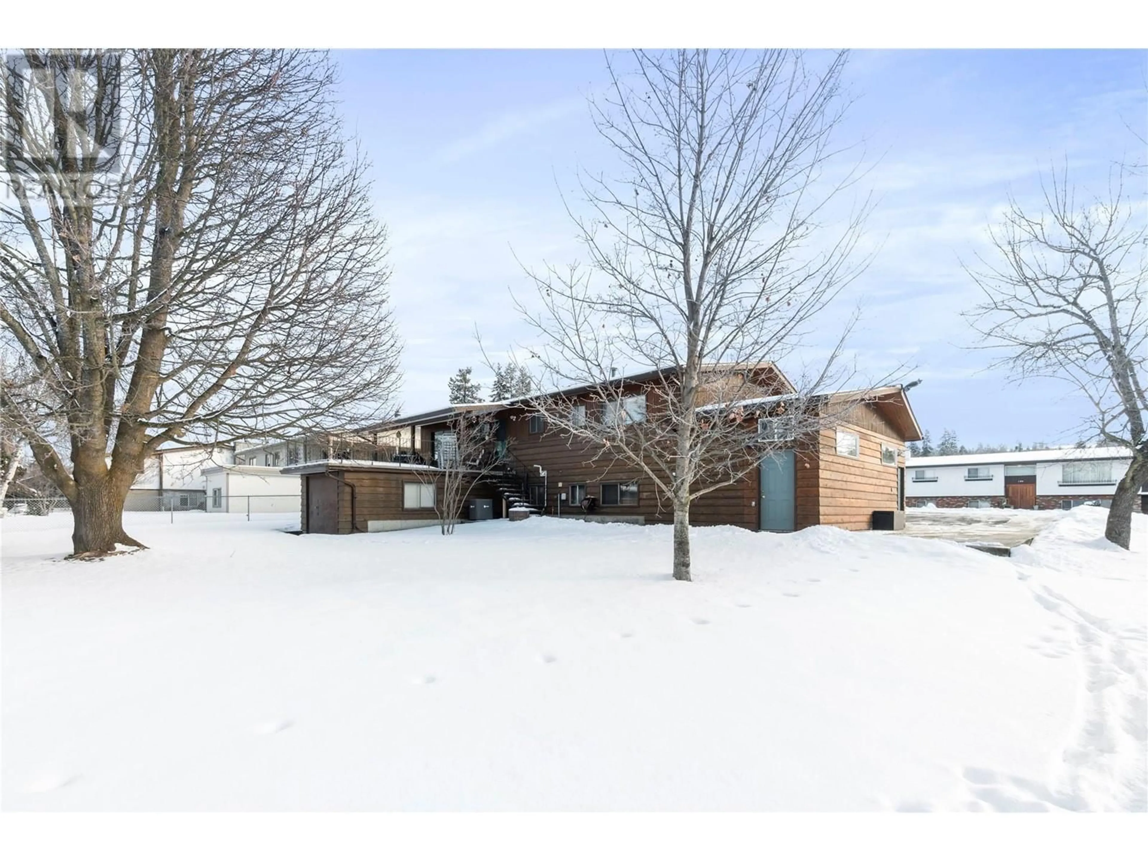 A pic from outside/outdoor area/front of a property/back of a property/a pic from drone, unknown for 121 16 Street NE, Salmon Arm British Columbia V1E1N5